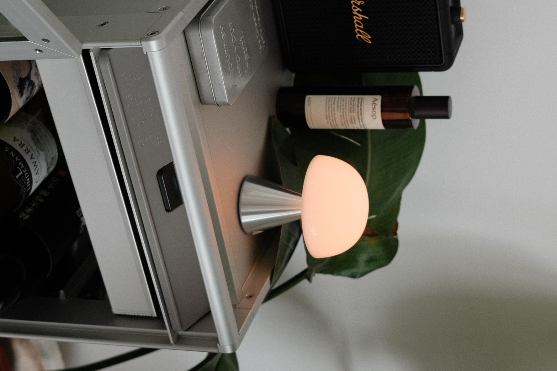 Welcome to a rented home designed to create and inspire - Modern wine rack, sleek design, ambient lighting, wine bottles