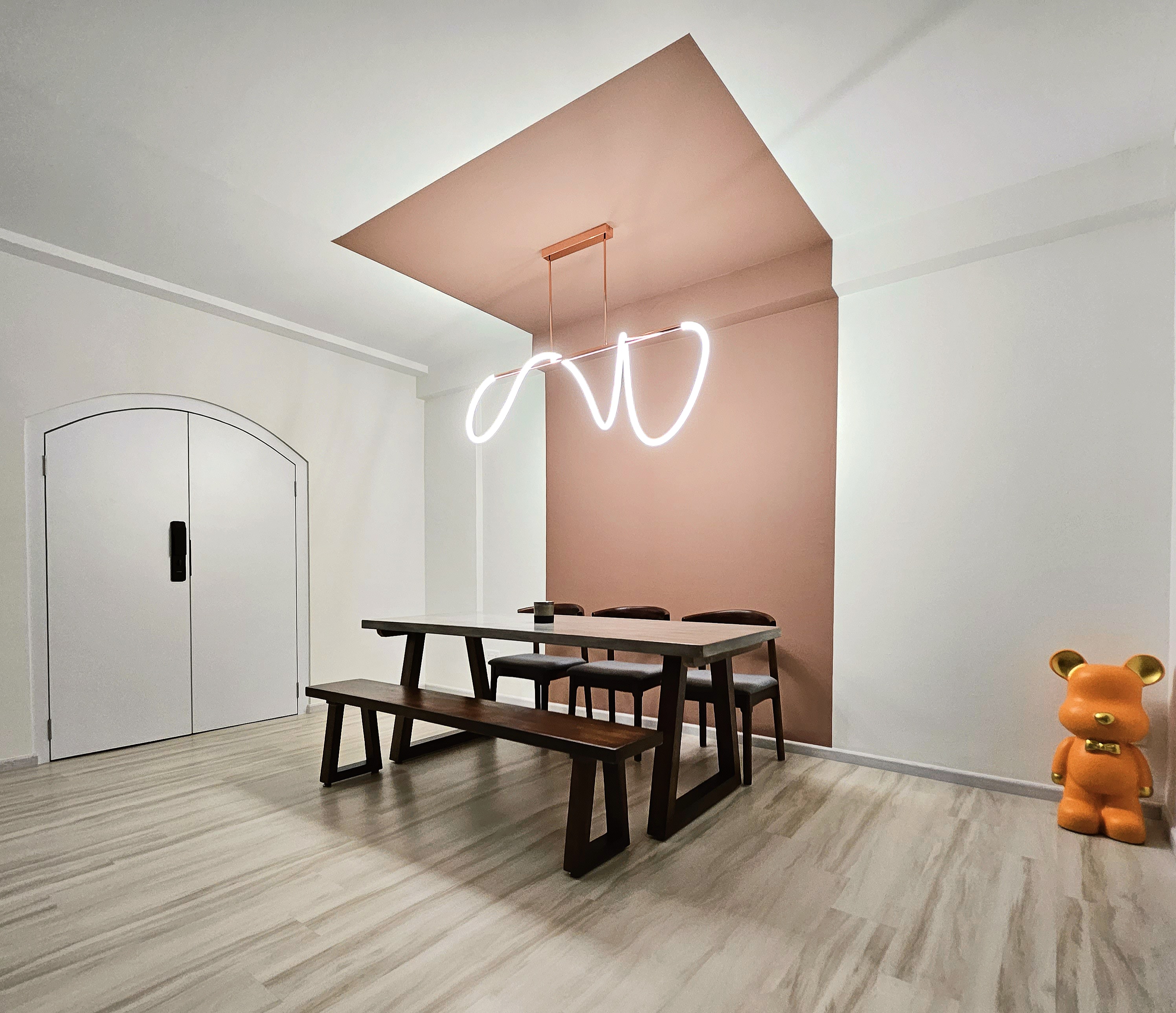 The theme-less abode - Modern minimalist dining room with sleek furniture, contemporary pendant lighting, light wooden floor