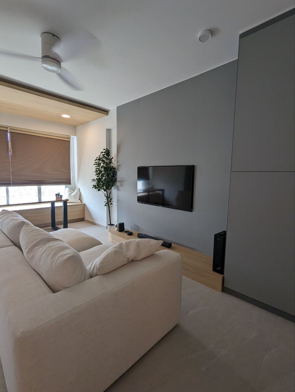 Building our own home quite literally - Modern minimalist living room, neutral color palette, beige sectional sofa, wooden