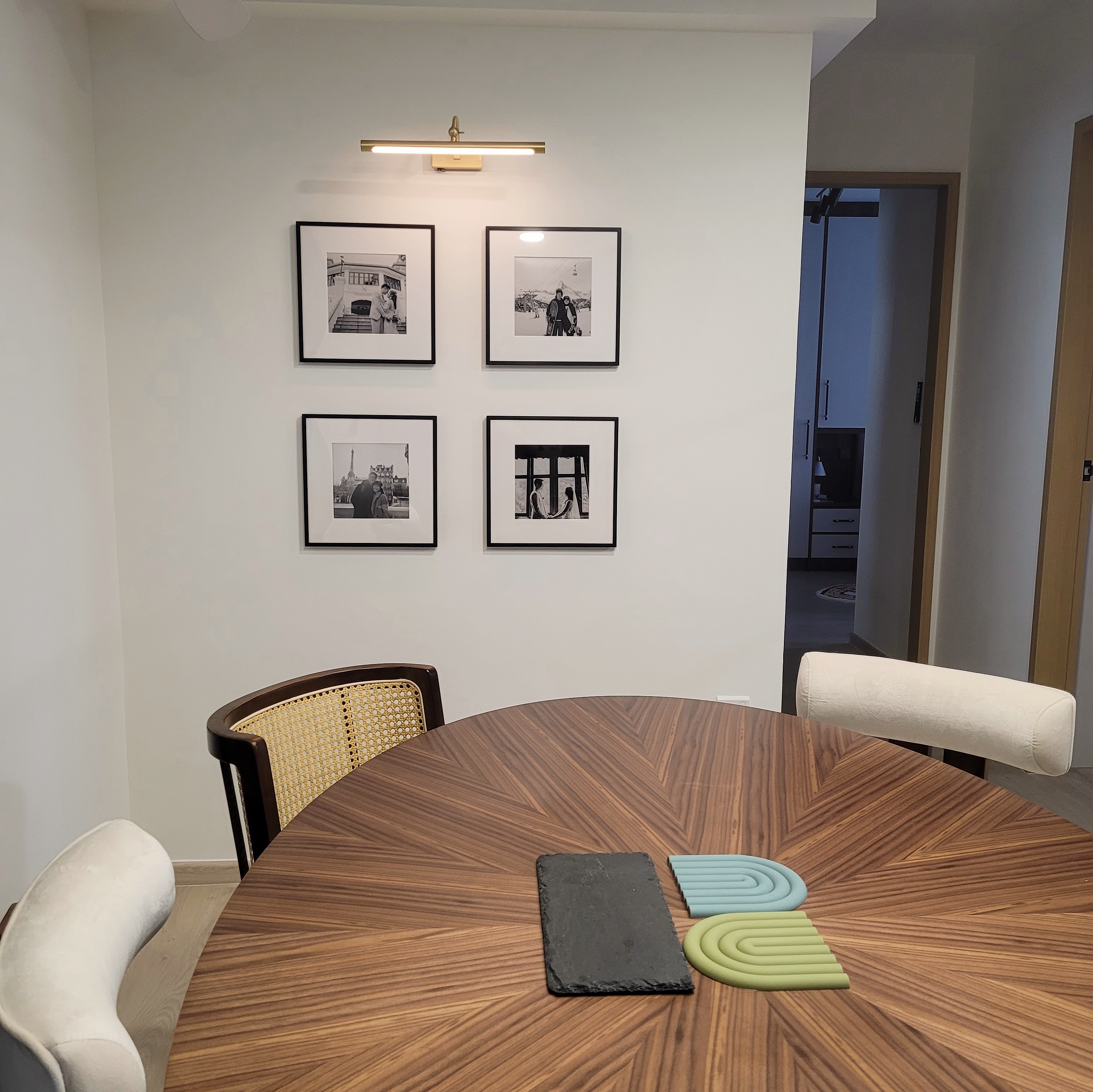 Step into our Modern Farmhouse with pops of Disney - Wooden dining table, modern interior, minimalist design, white walls