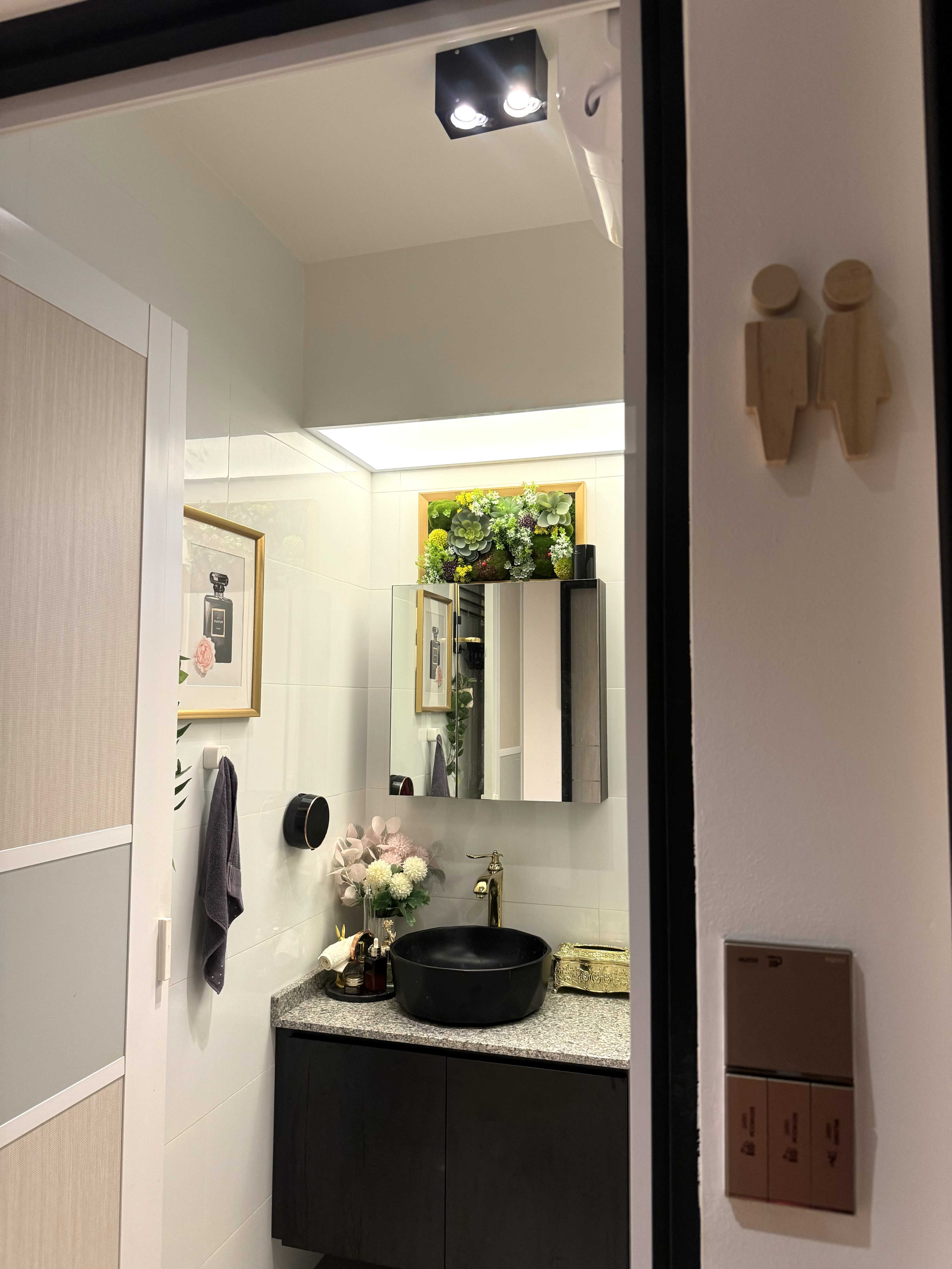 A Cafe Concept BTO in Tampines Greenverge - Modern bathroom interior, minimalist design, sleek fixtures, black countertop