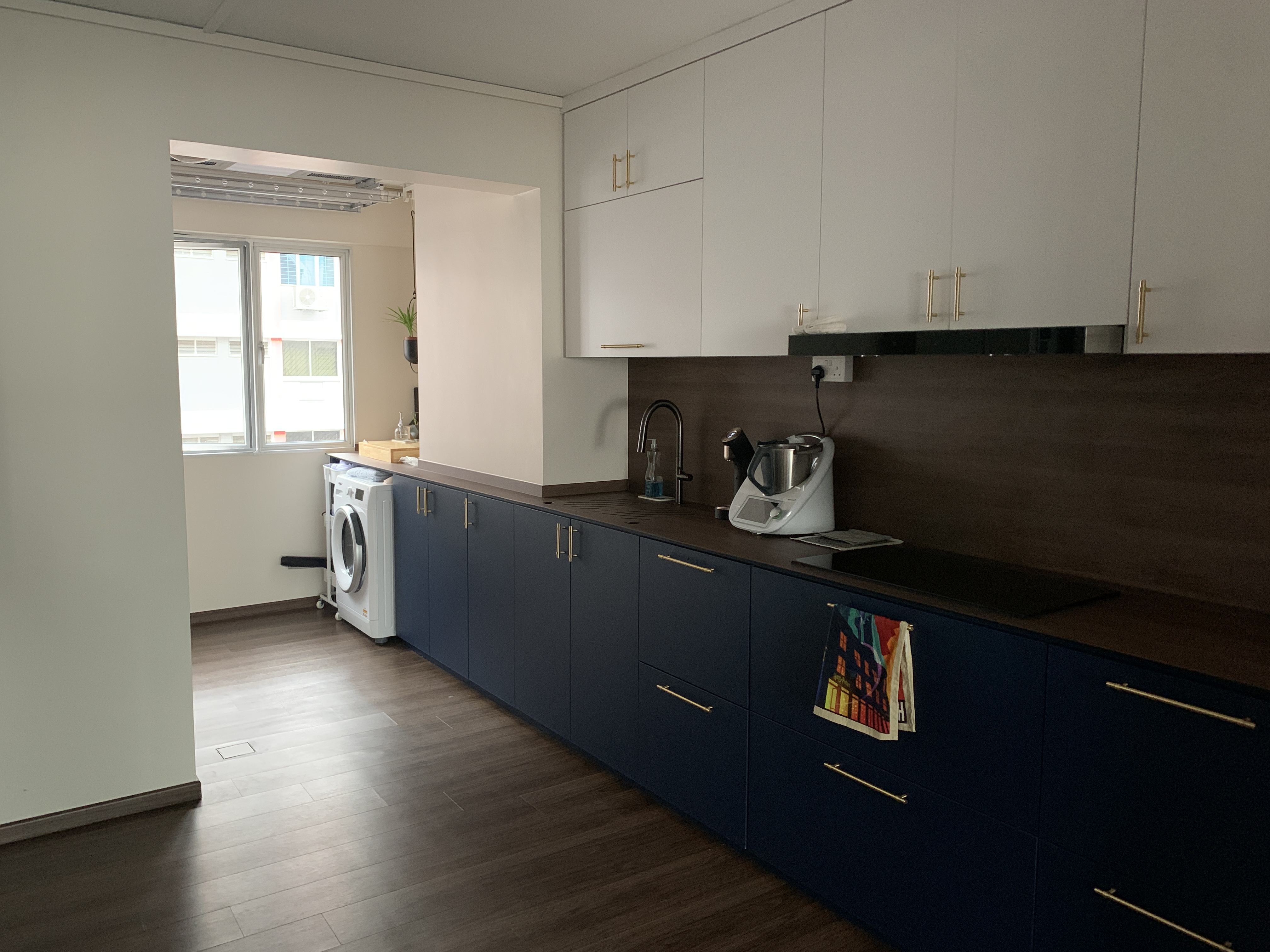 Transforming A 30 Year Old Resale HDB - We Bought After 1 Viewing - Modern kitchen with dark cabinetry and gold handles