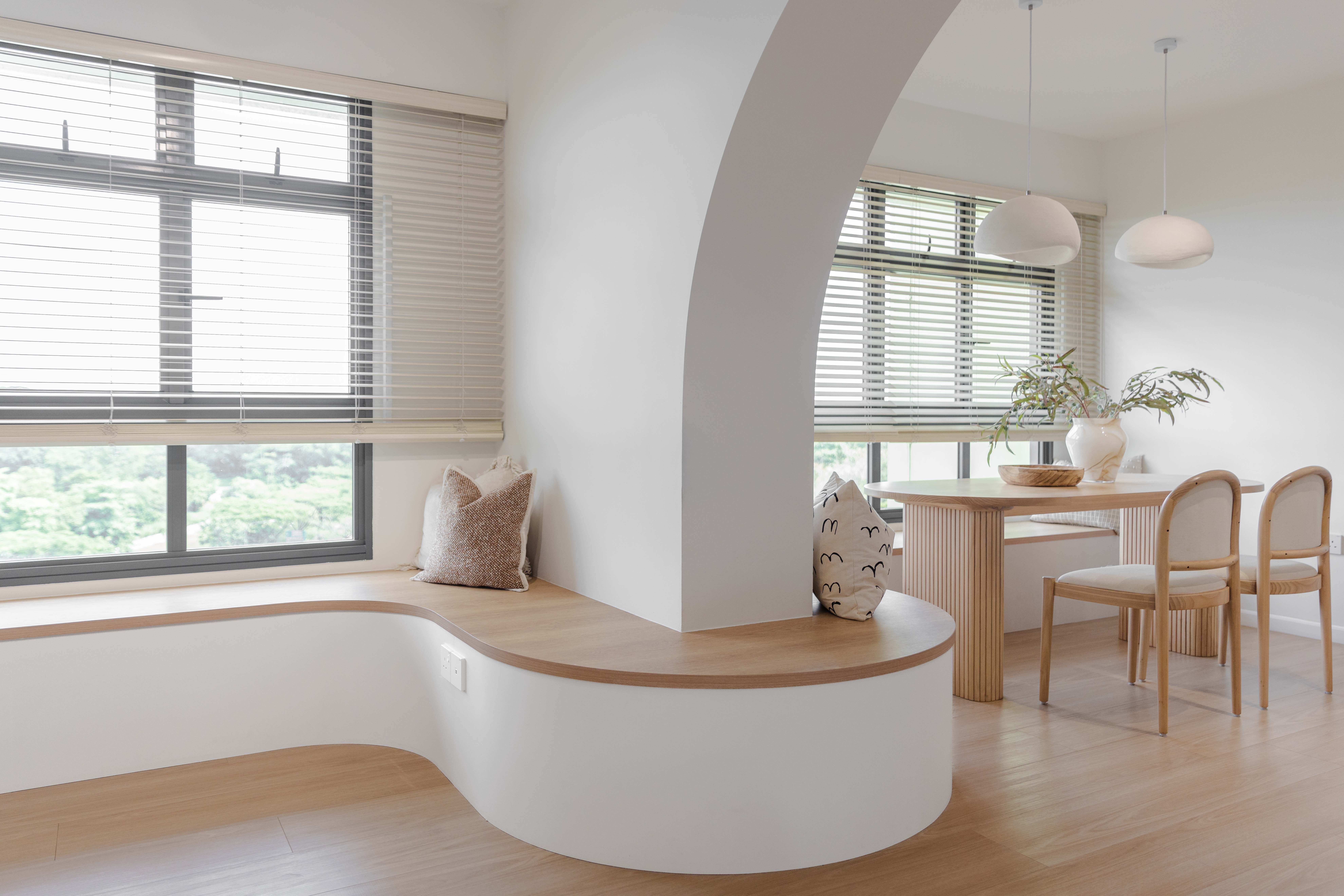 Bright, Airy & Curvy! - Modern minimalist interior, large windows with blinds, soft natural light, white and beige color