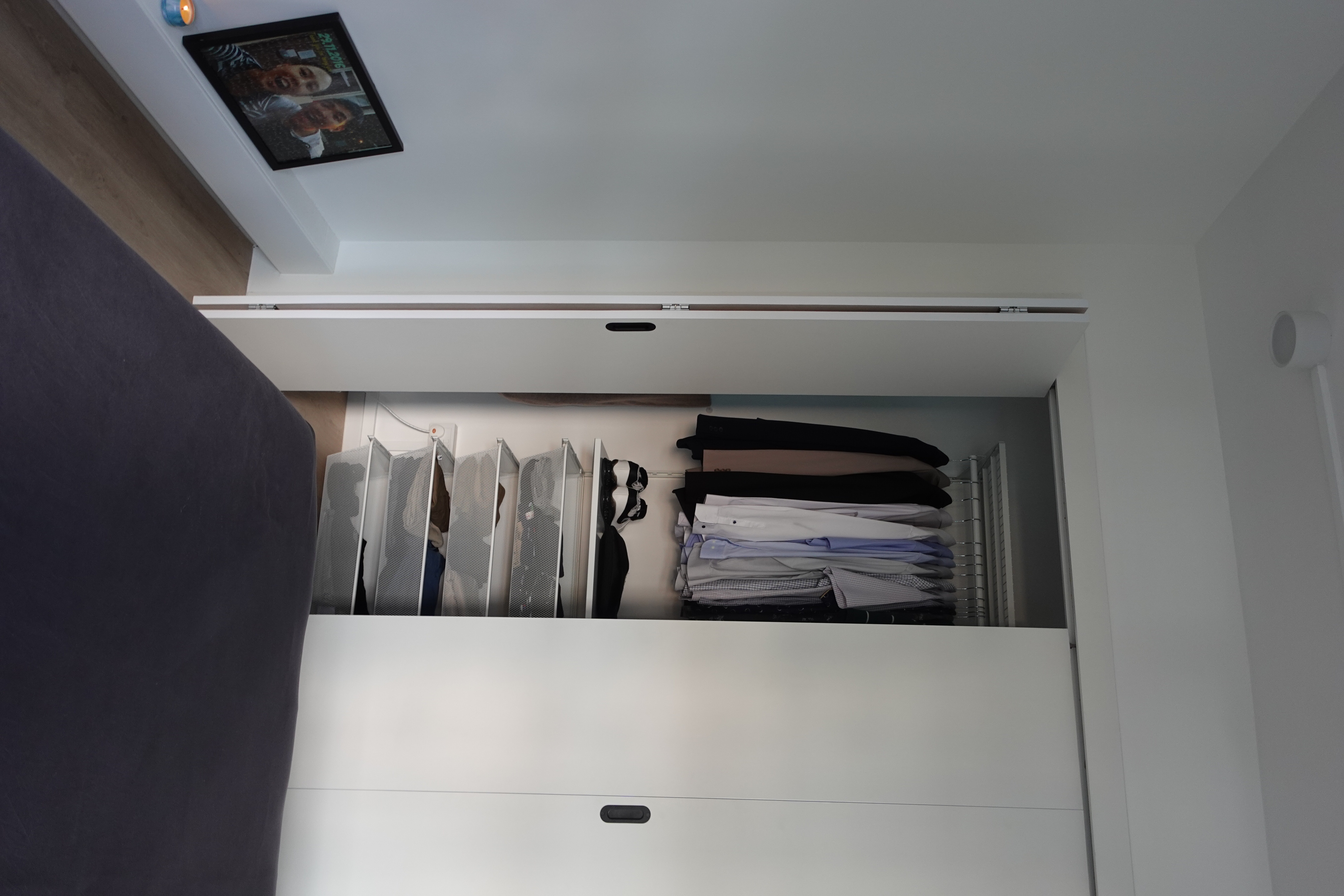O hey there, welcome to our "minimalist" home   - Modern wardrobe with neatly folded clothes, white open closet with drawers