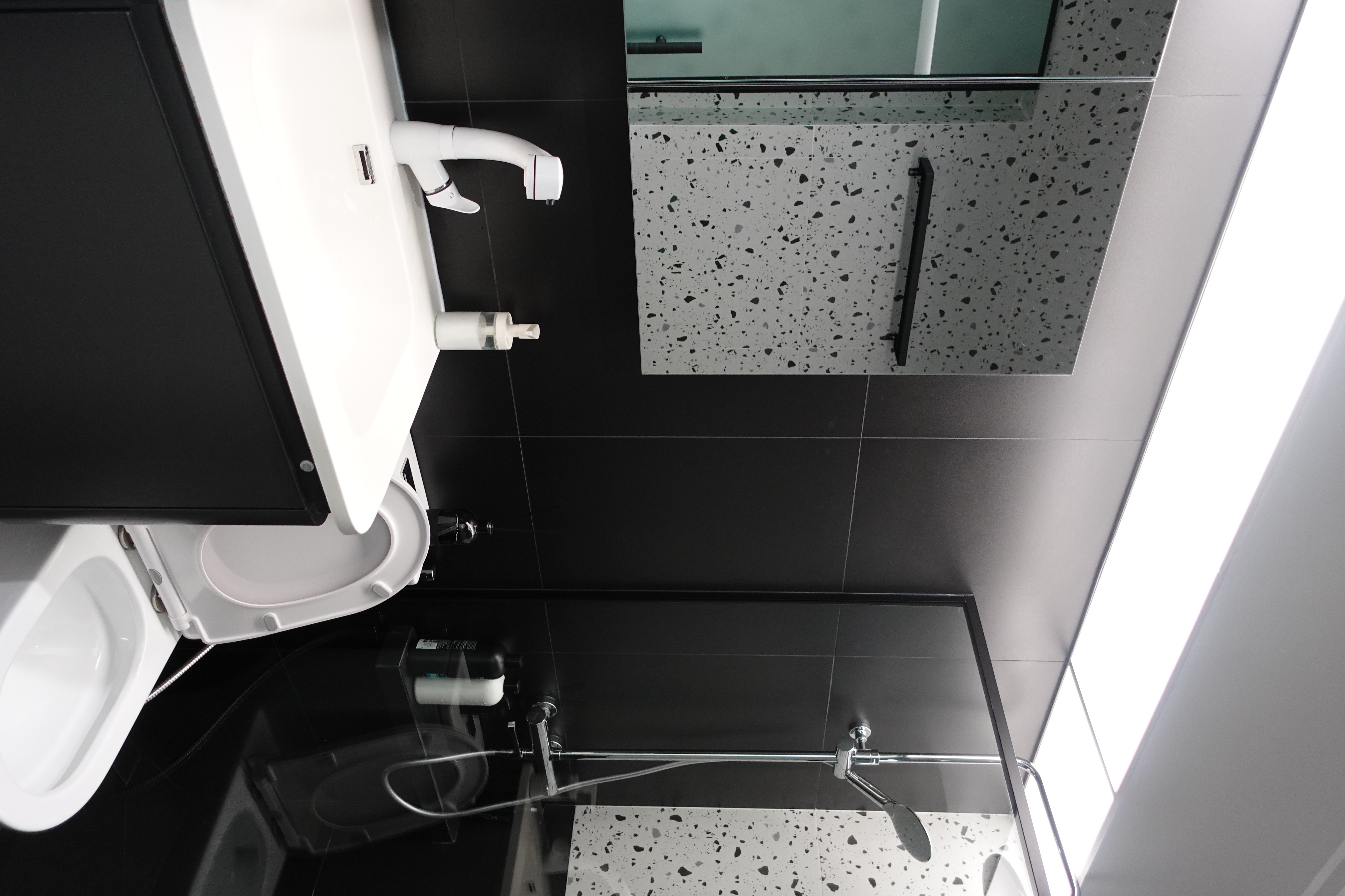 O hey there, welcome to our "minimalist" home   - Modern bathroom, sleek design, black and white color scheme, minimalist