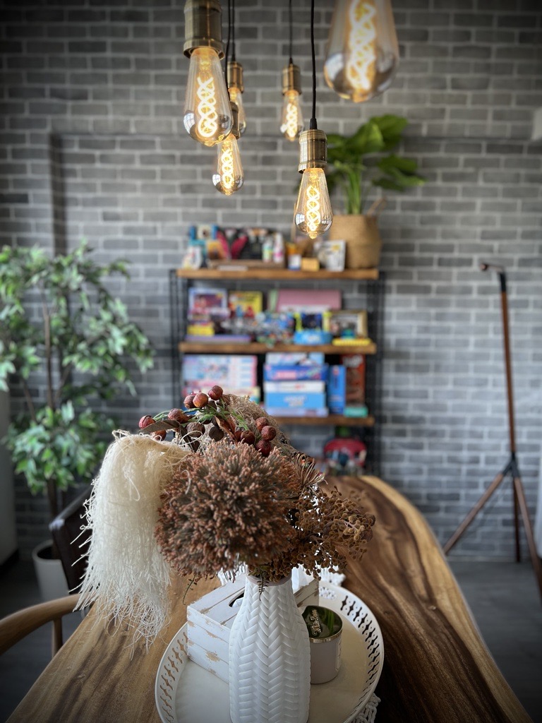 A digital journal of our home improvement projects - vintage pendant lights, brick wall background, cozy ambiance, rustic