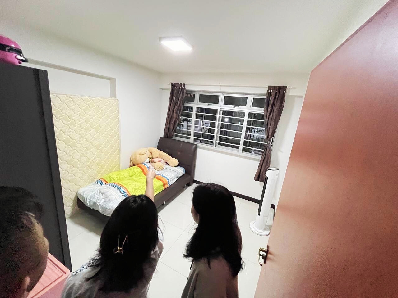 Transforming our HDB flat to a Filipino-inspired Villa Home - Bed with a person lying on it, wearing a large teddy bear