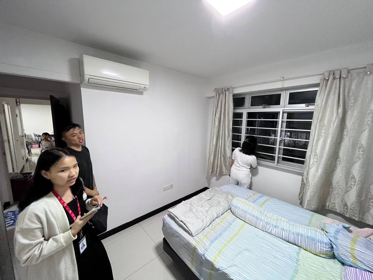 Transforming our HDB flat to a Filipino-inspired Villa Home - Interior view of a well-lit bedroom with a large window and