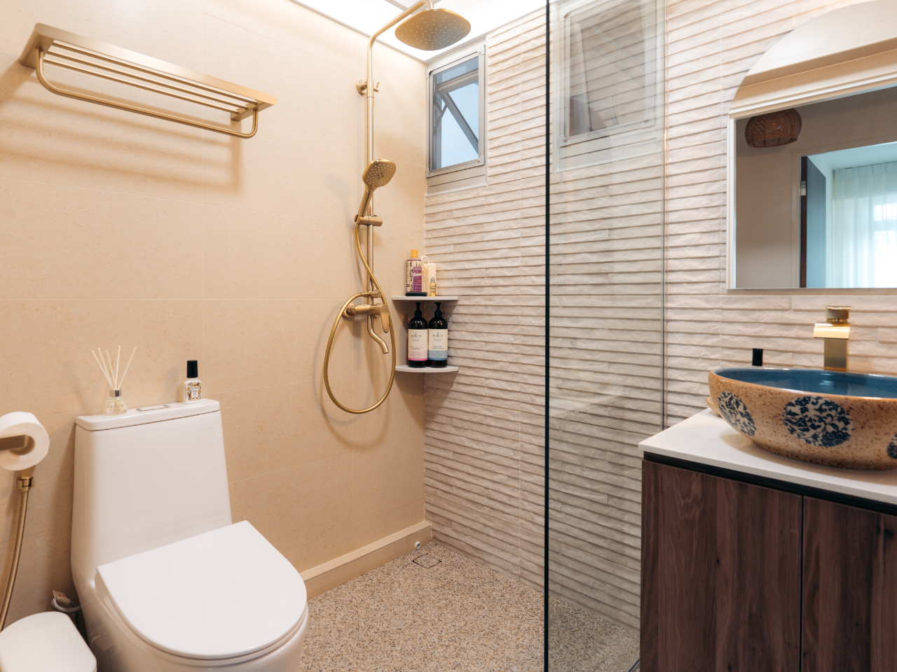 Transforming our HDB flat to a Filipino-inspired Villa Home - Gold-hued bathroom fixtures, beige tiled walls, modern