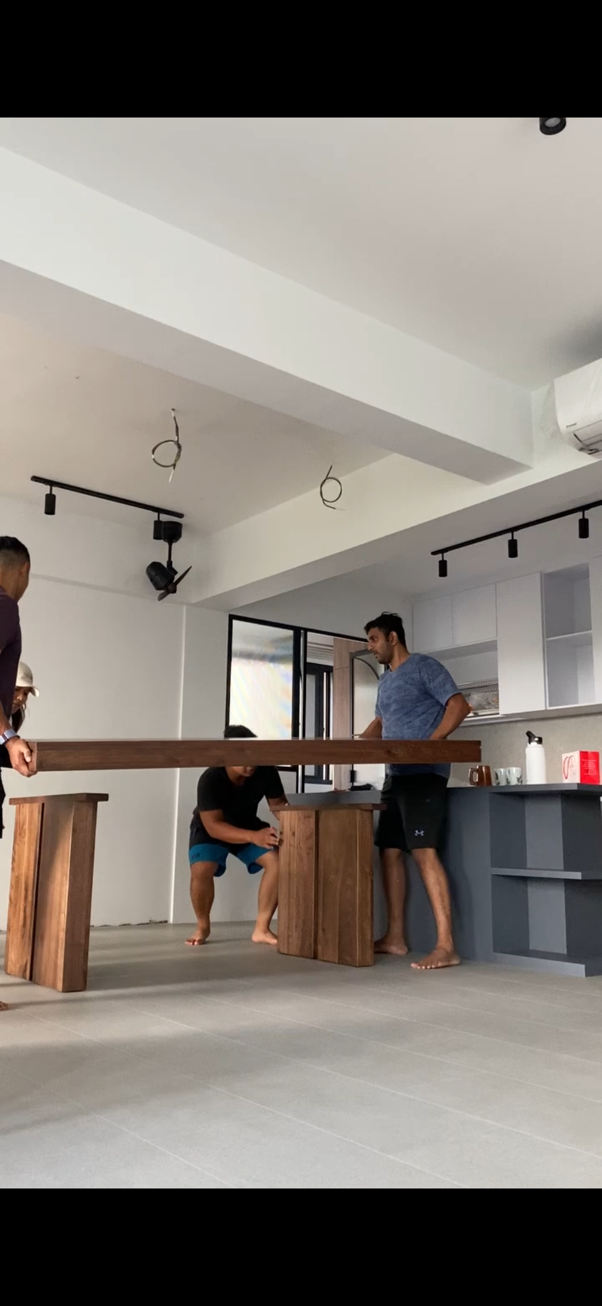 Our Dining Space: Open and Spacious yet Cosy - Modern kitchen, wooden table, two men working, kitchen island, white ceiling