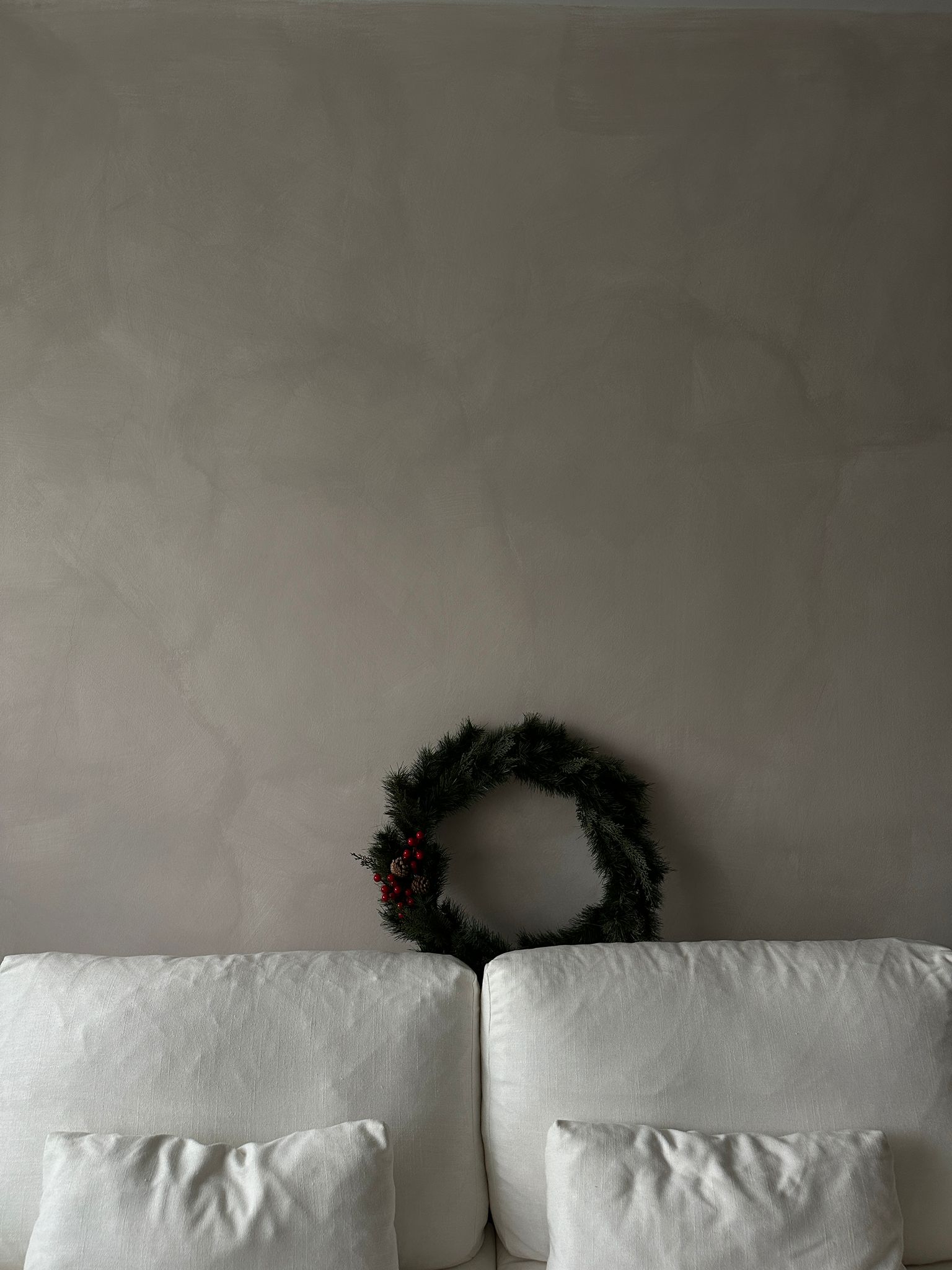 Bringing our Japandi theme to life - White sofa, minimalist decor, cozy atmosphere, soft lighting, neutral color palette