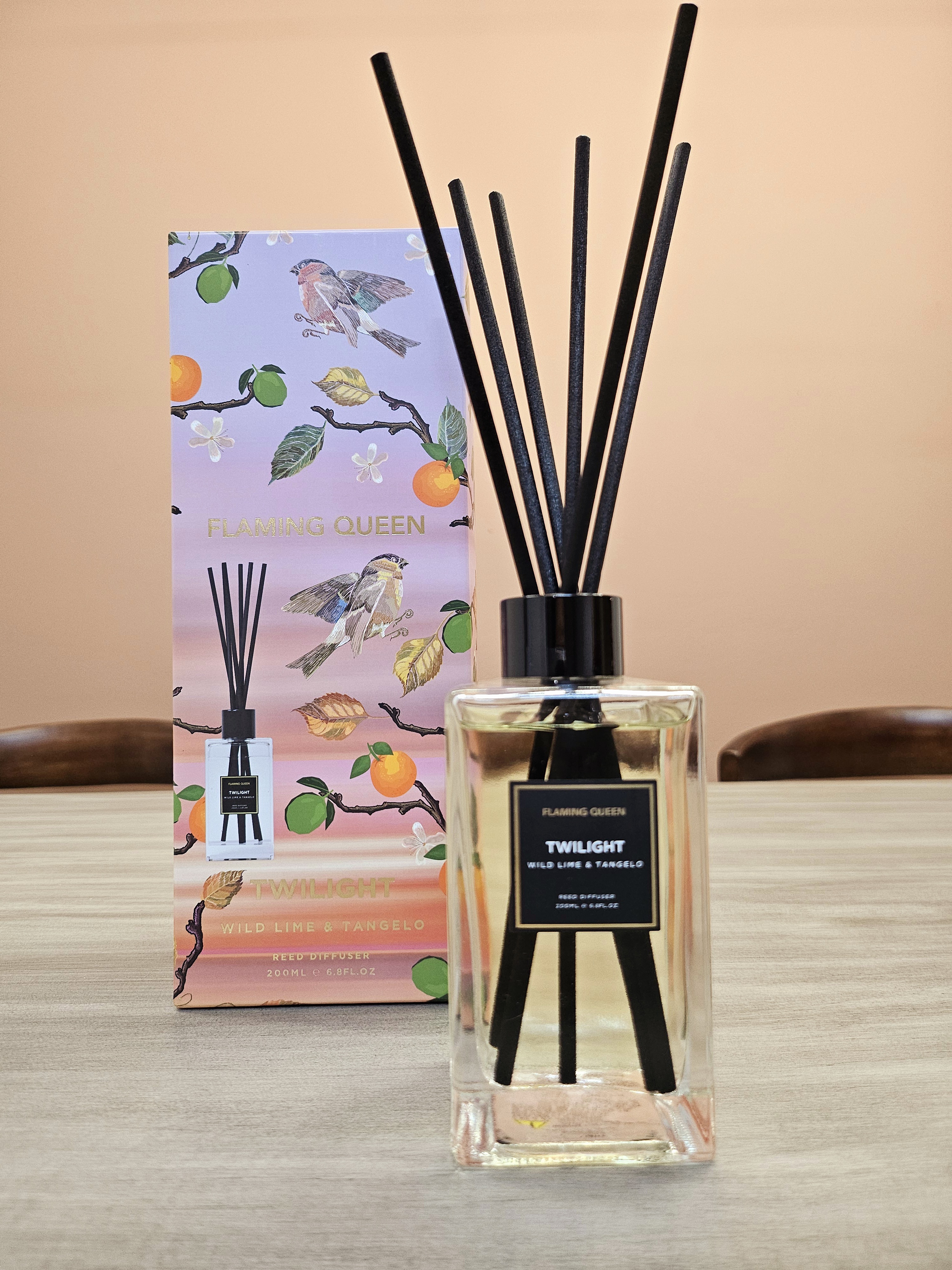 Our dining space: For Intimate Gatherings & Cherished Moments - Flamethrower, scented, black sticks, wooden table, peach and