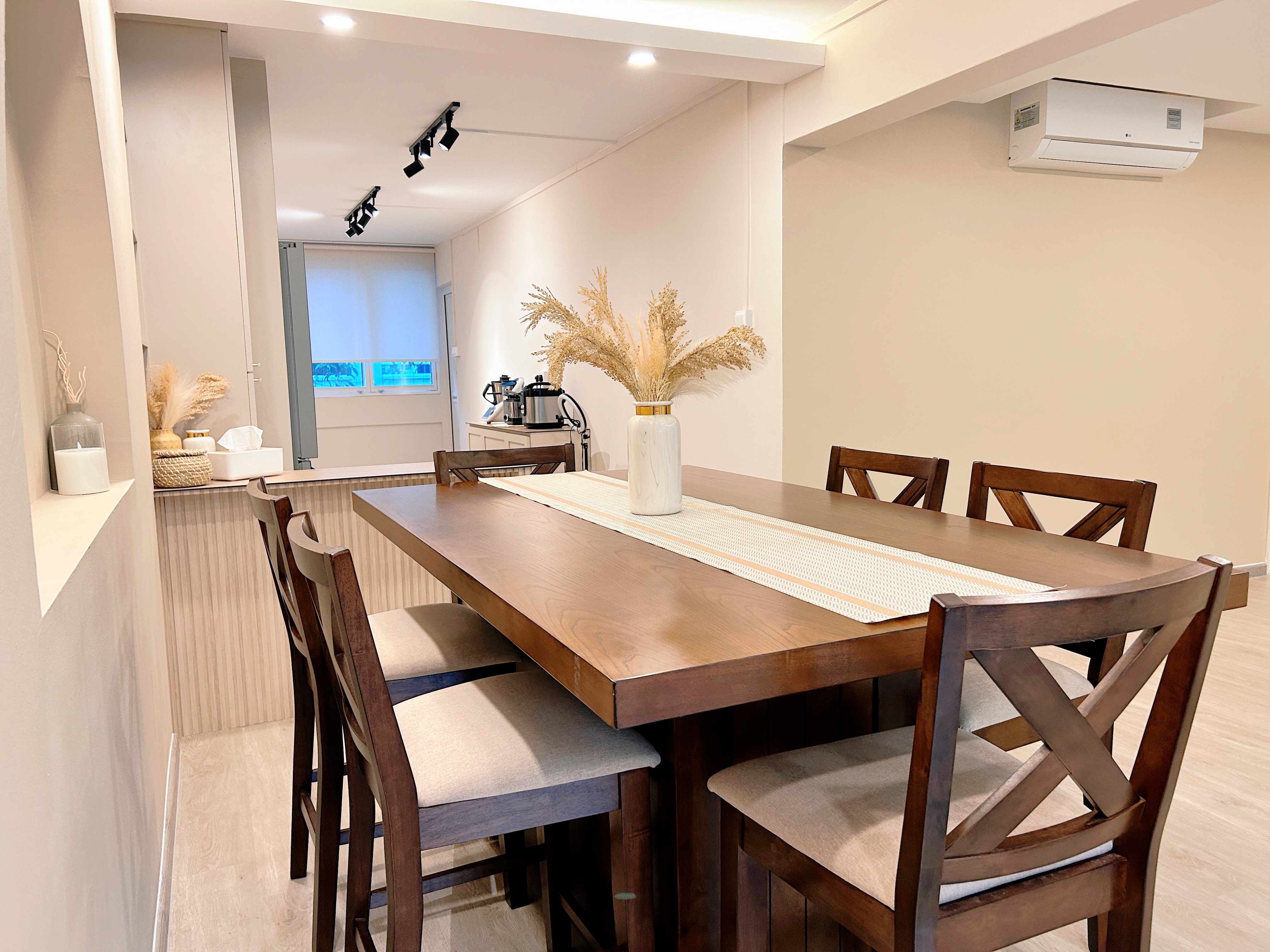 Our inviting dining space! - Modern dining room with wooden table and chairs, minimalist decor, neutral color palette