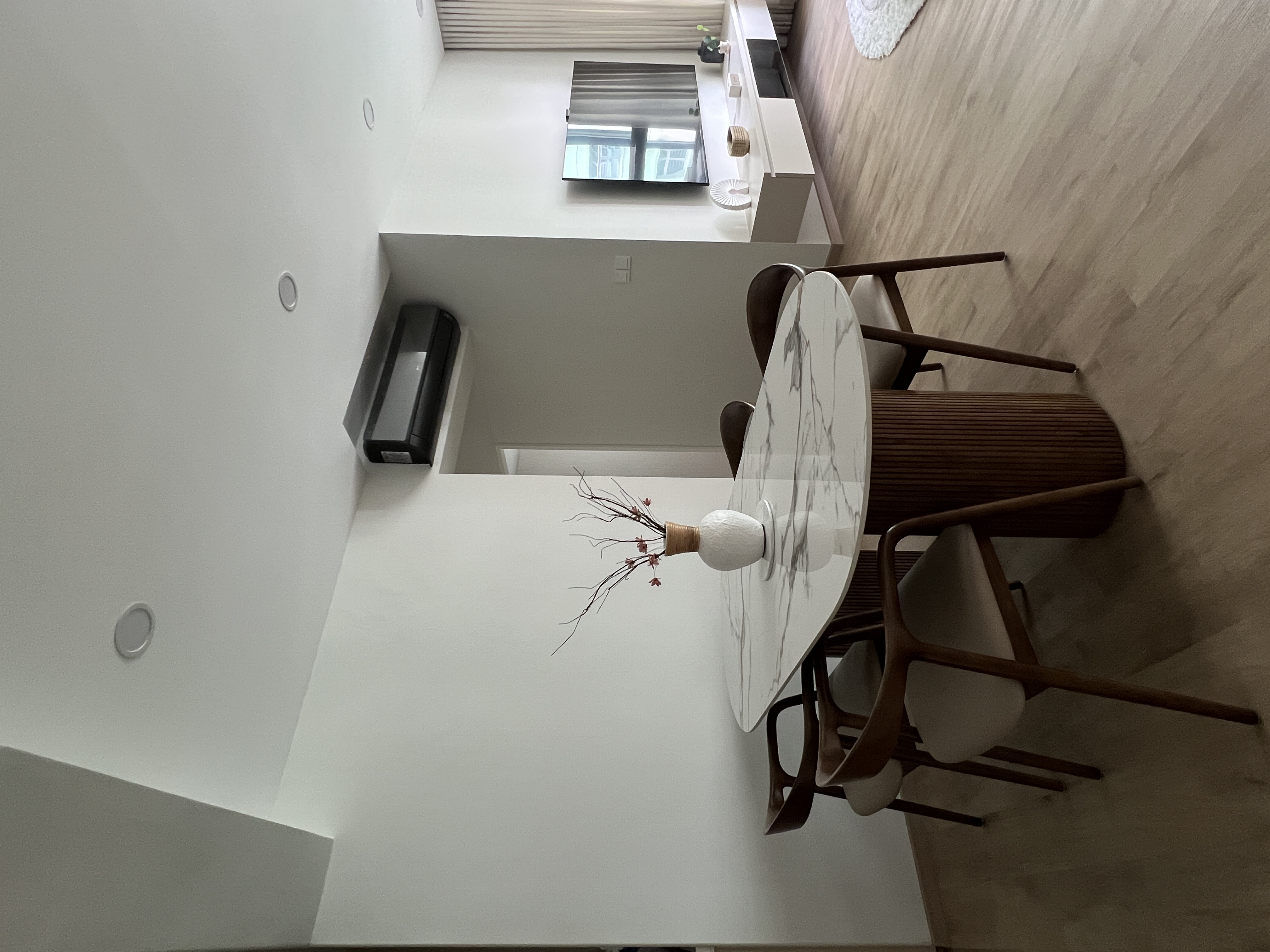 A minimalist/lux multi-functional dining space! - Modern minimalist dining room, sleek white marble table, wooden dining