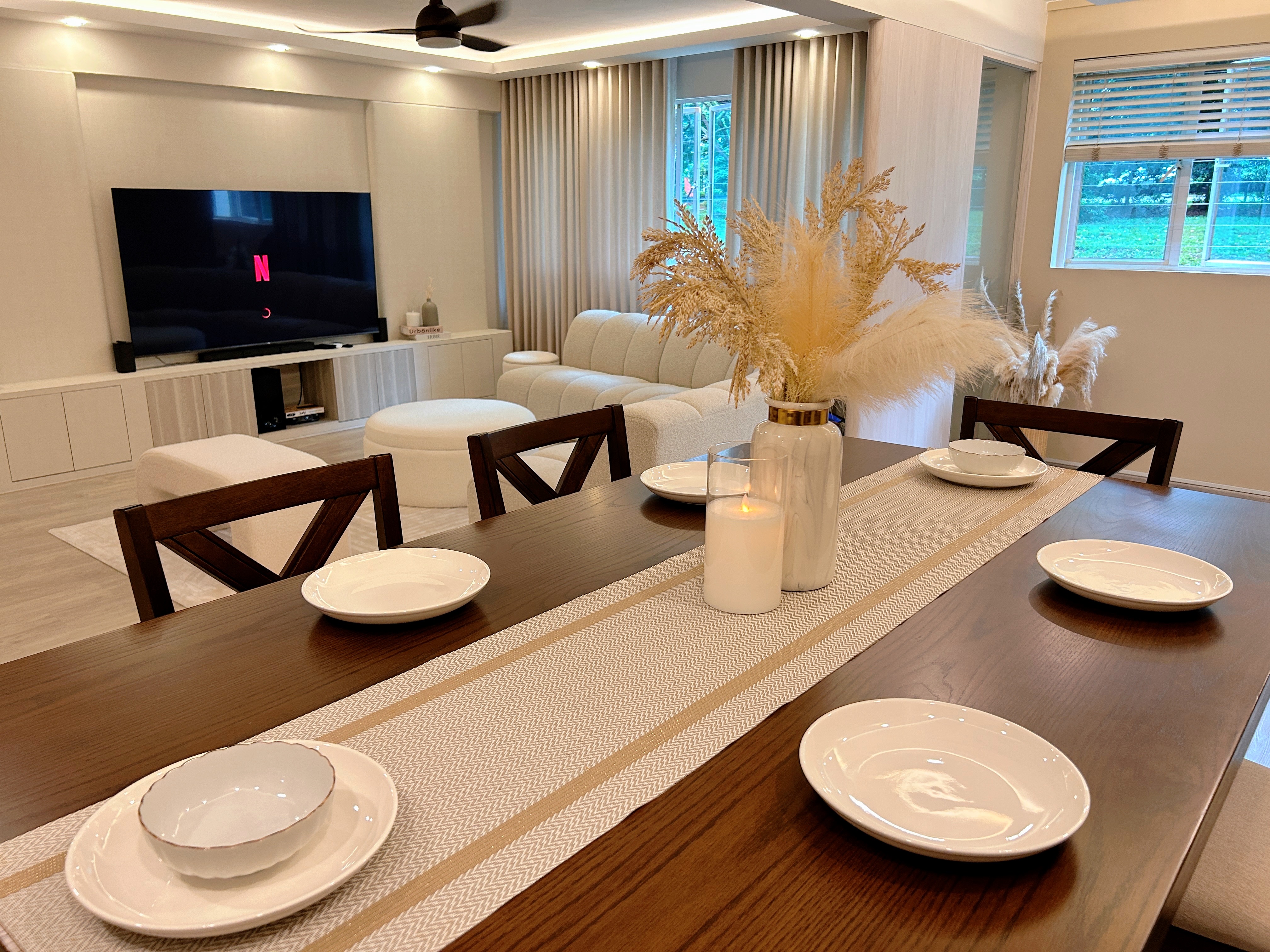 Welcome to Marshy Home! - Modern living room with sleek furniture, contemporary dining table set, minimalist decor, warm