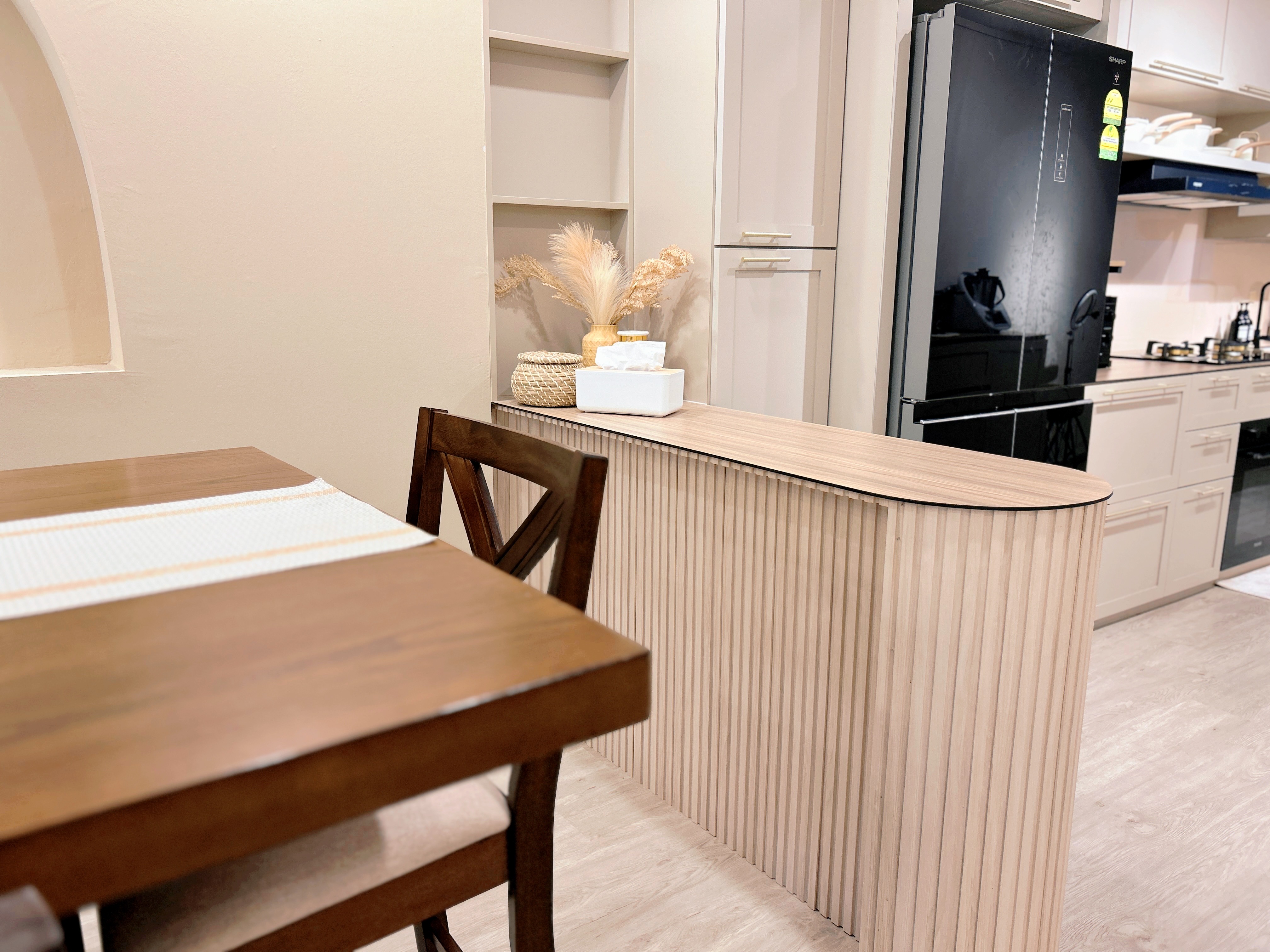 Welcome to Marshy Home! - Wooden dining table, minimalist kitchen, modern kitchen design, light beige walls, wooden cabinets