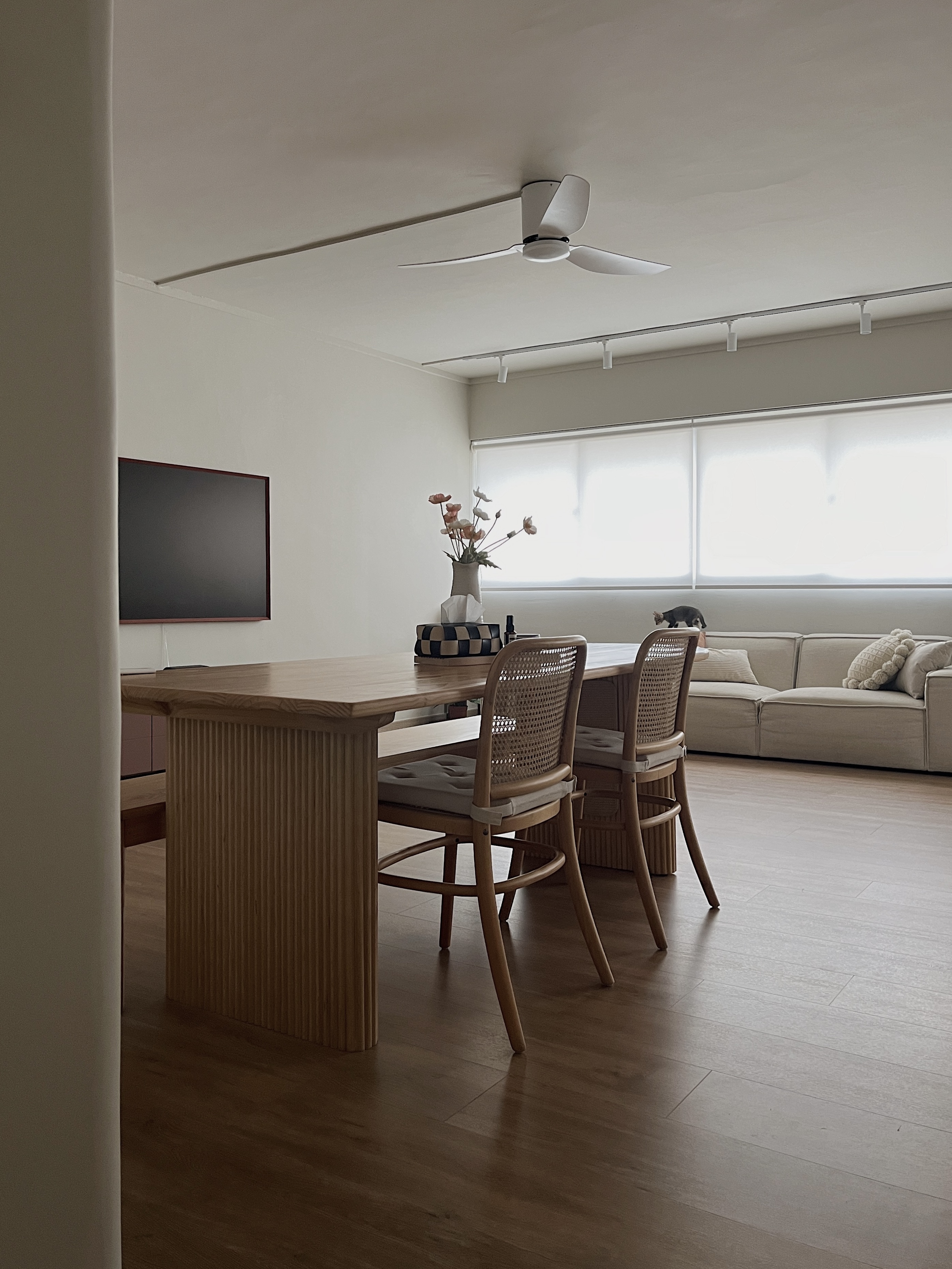 A calm and cosy space - Wooden dining table, minimalist design, modern decor, neutral color palette, large window, soft