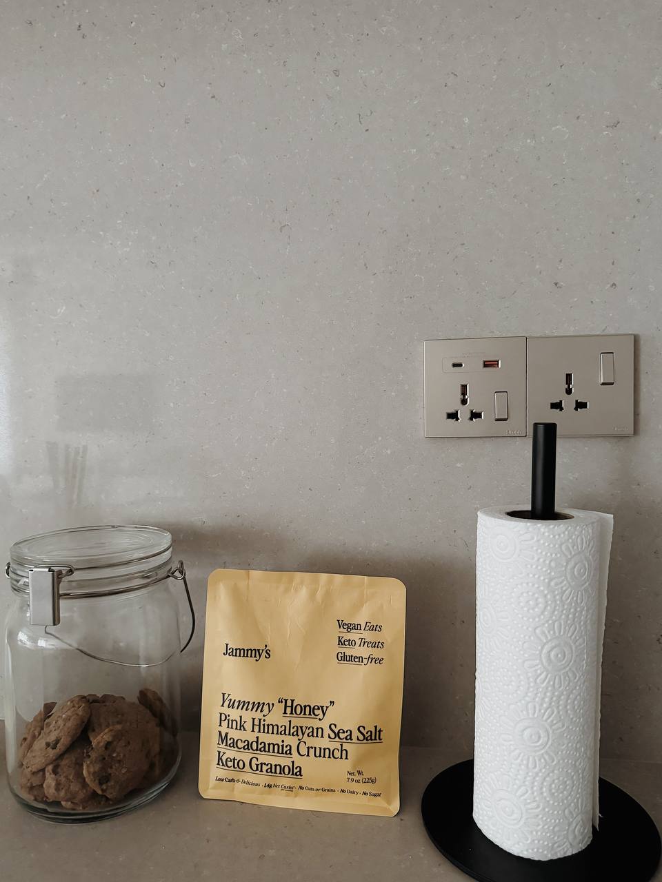 Dining Space: Making every Meal a Communal Experience - Glass jar filled with cookies, yellow bag of granola, white toilet