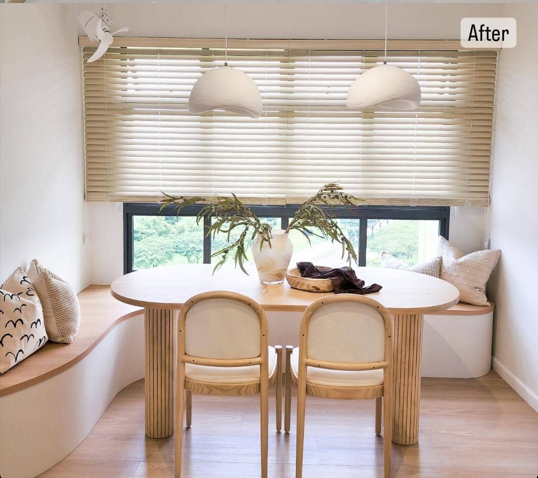 Dining Space - Embracing The Curves  - Wooden dining table, modern chairs, minimalist decor, natural light, cozy seating