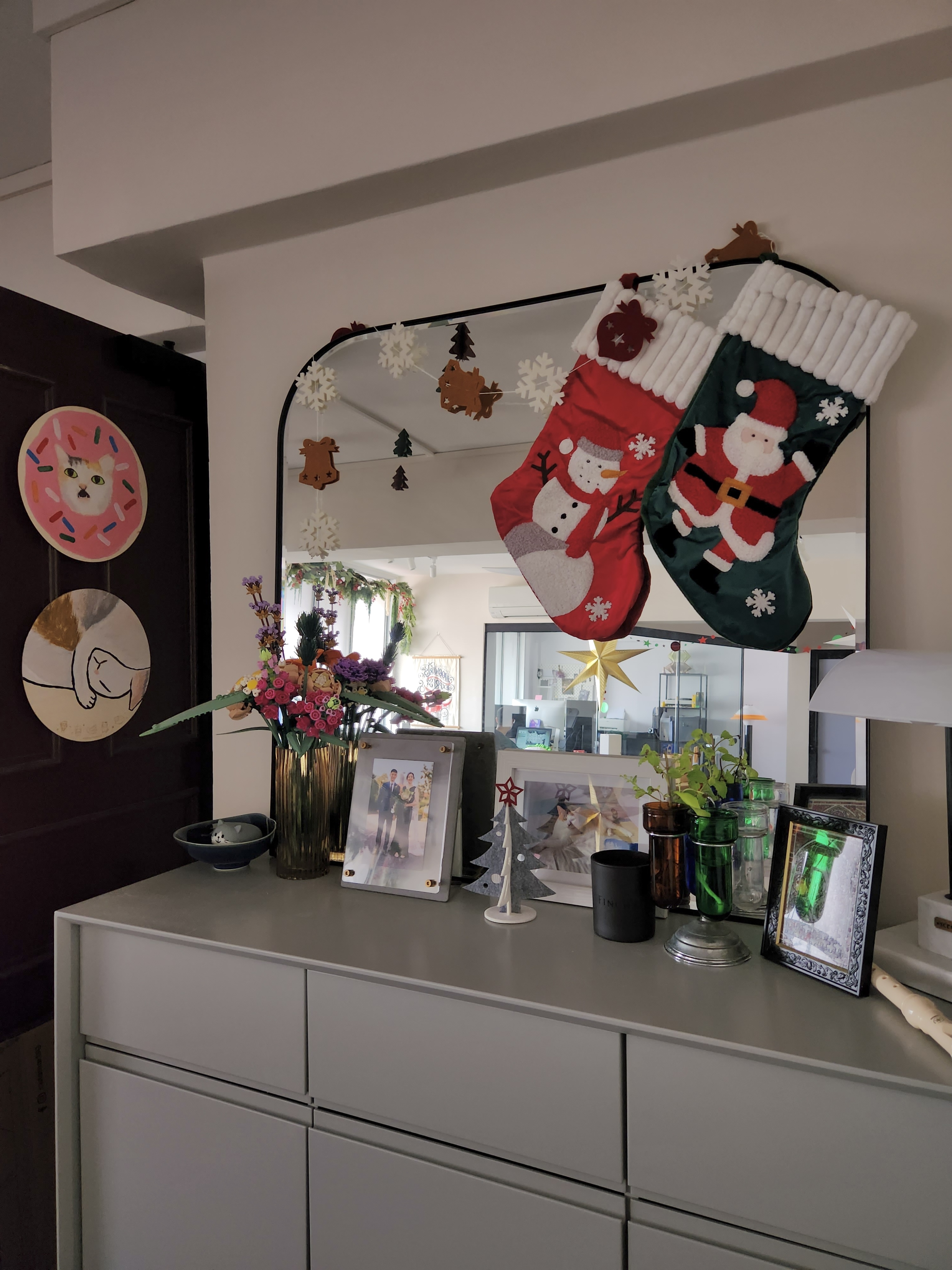 A maximalist Christmas set-up with DIY touches! - Christmas decorations, festive stockings, red and green colors, snowflakes