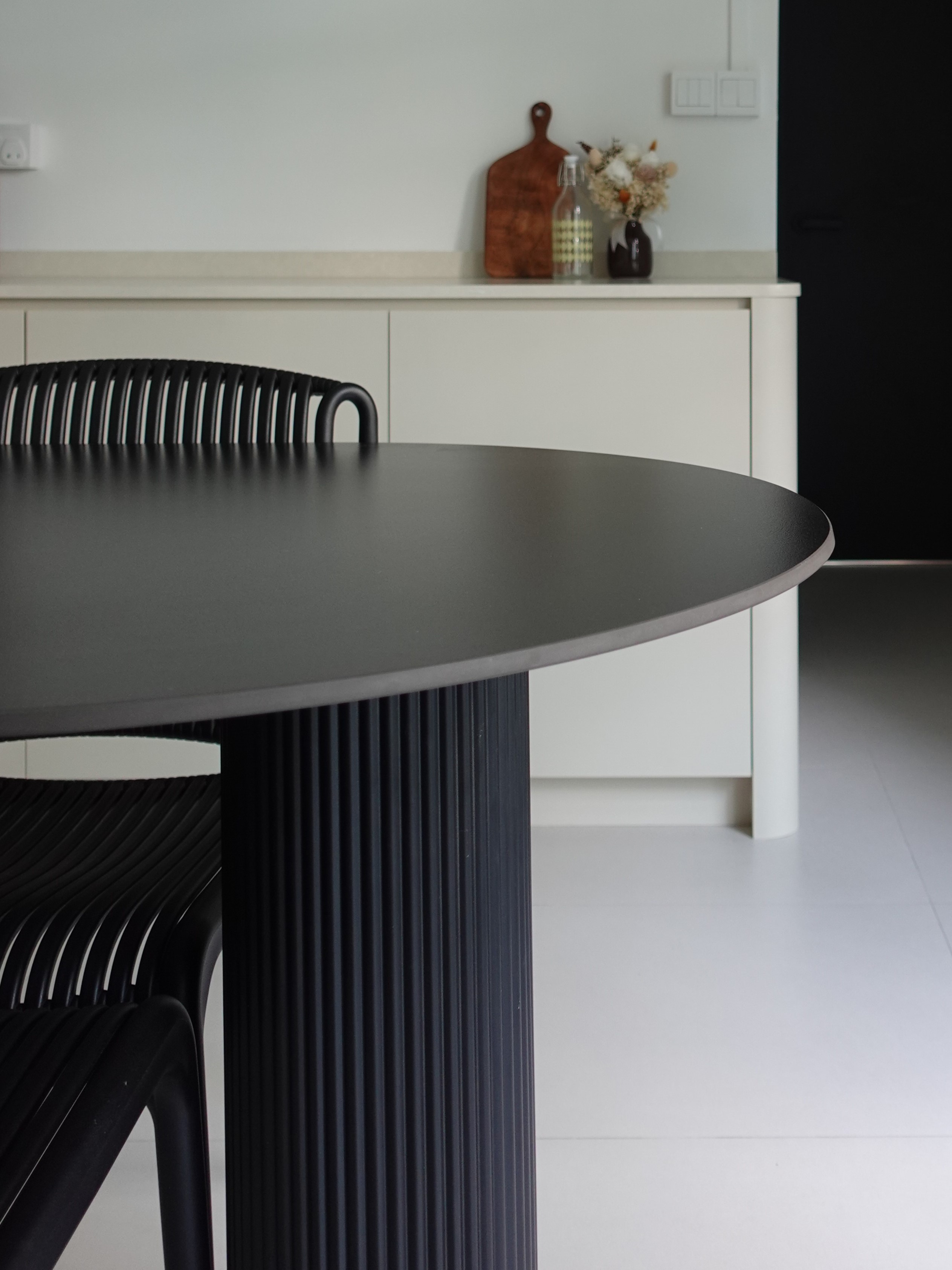How we kept our dining room visually clutter-free - modern kitchen, minimalist design, sleek table, black chairs