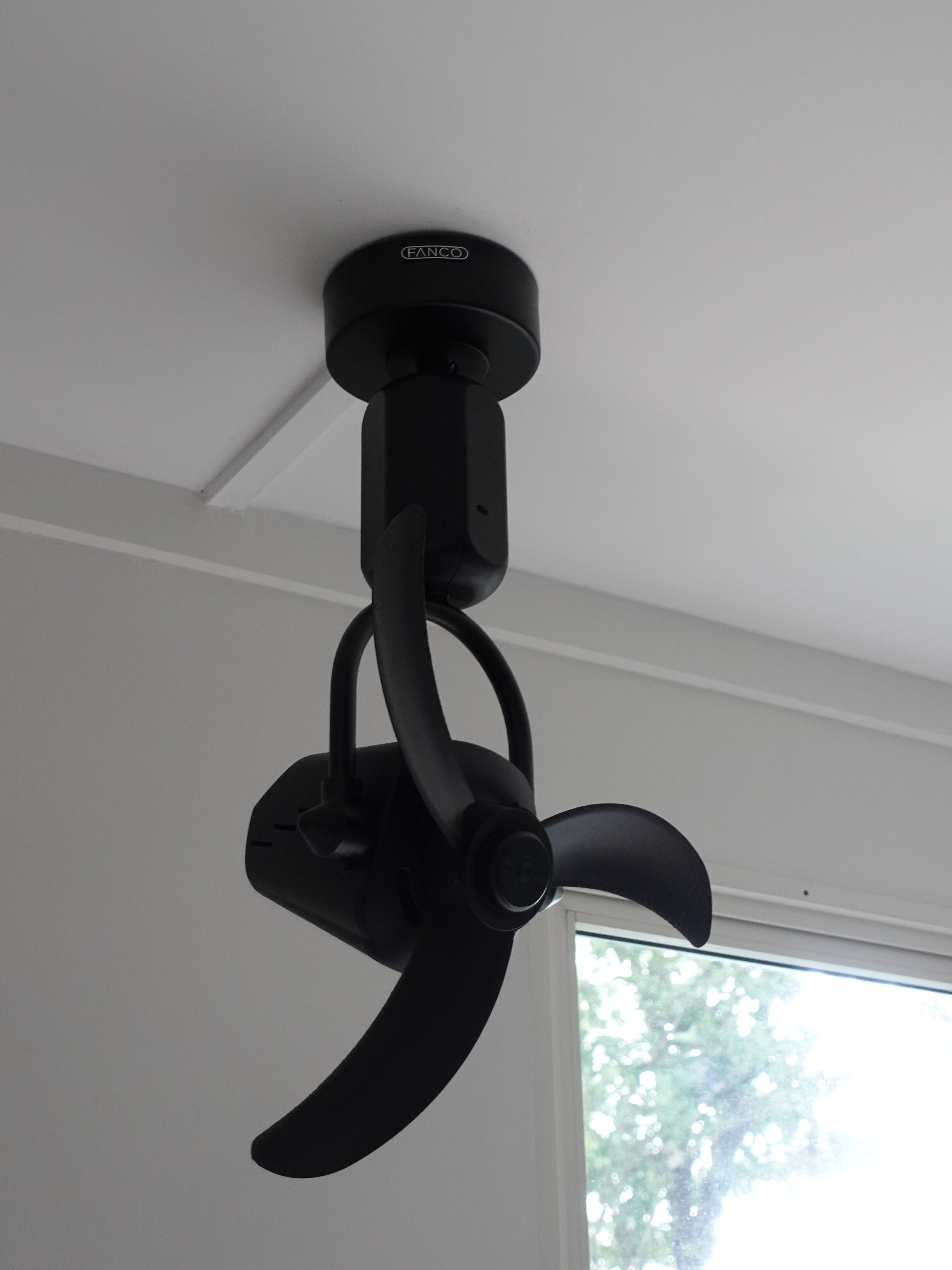How we kept our dining room visually clutter-free - FANCO ceiling fan, black ceiling mount, sleek design, modern style