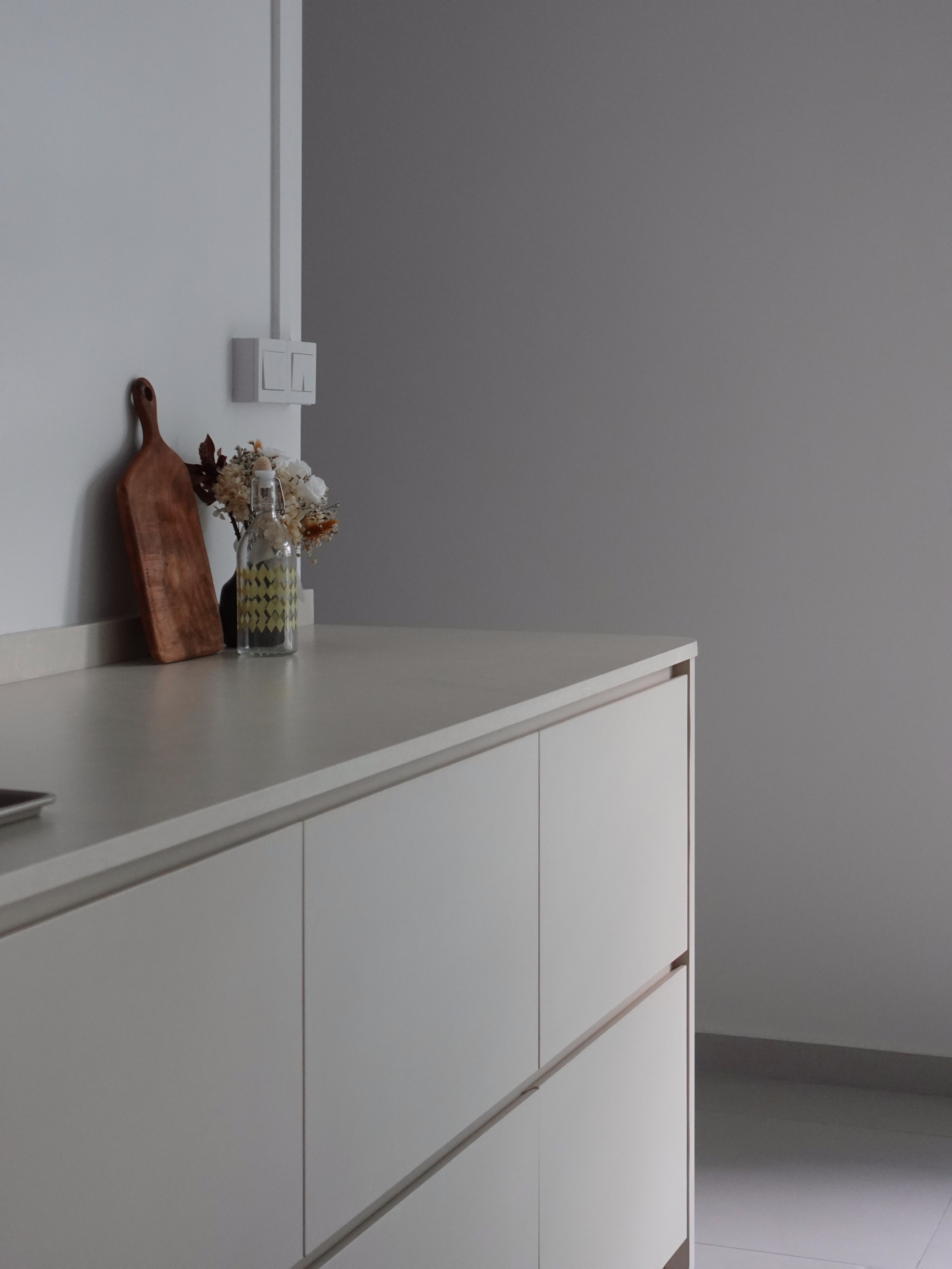 How we kept our dining room visually clutter-free - White kitchen countertop, minimalist design, modern kitchen, white