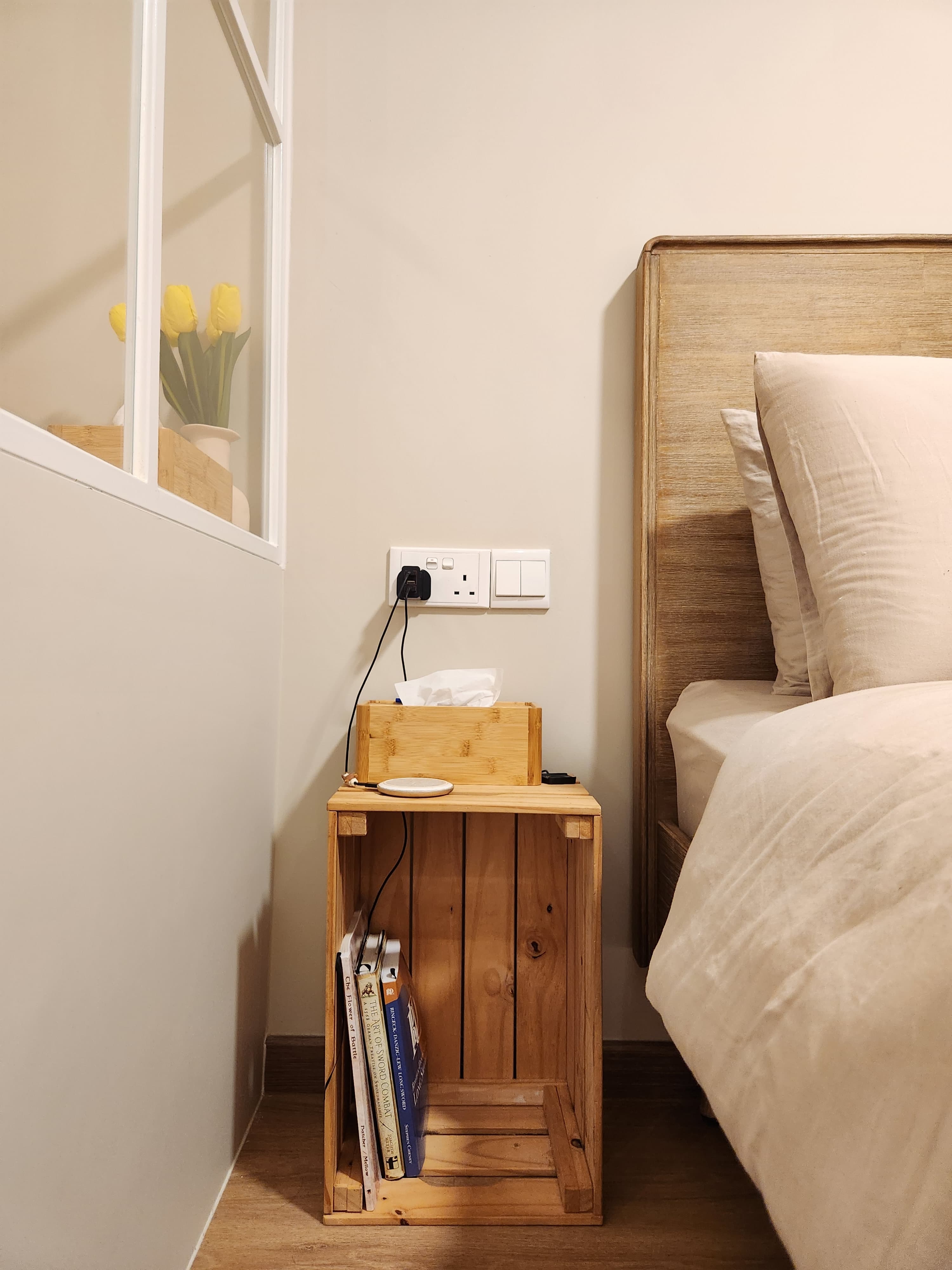 Restful Retreat in Our Neutral-Toned Master Bedroom - Wooden nightstand, beige bedding, bedside table, books, tissue box
