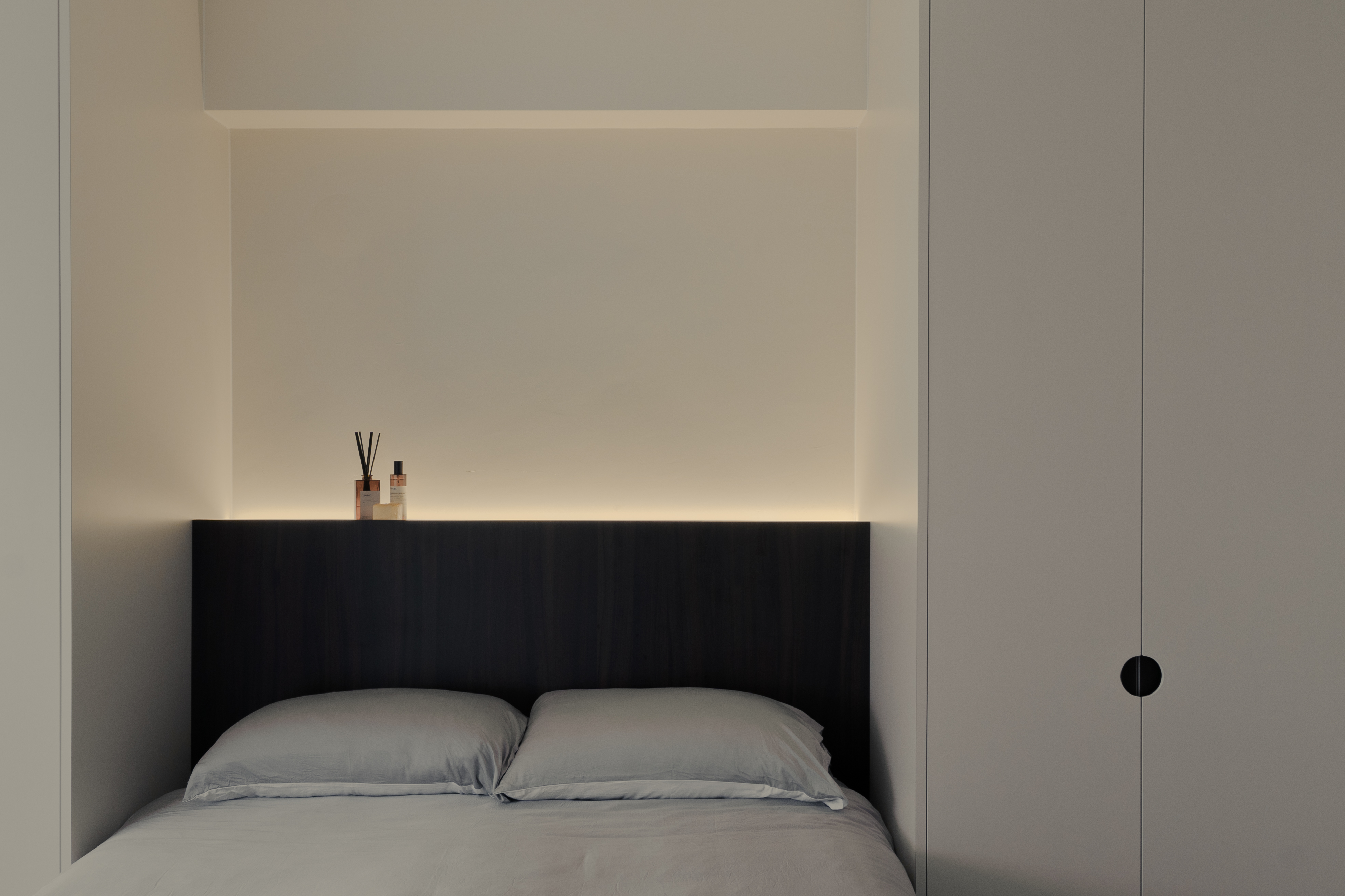 Our Master Bedroom: A peaceful space for undisturbed rest - Modern minimalist bedroom, sleek headboard, neutral color