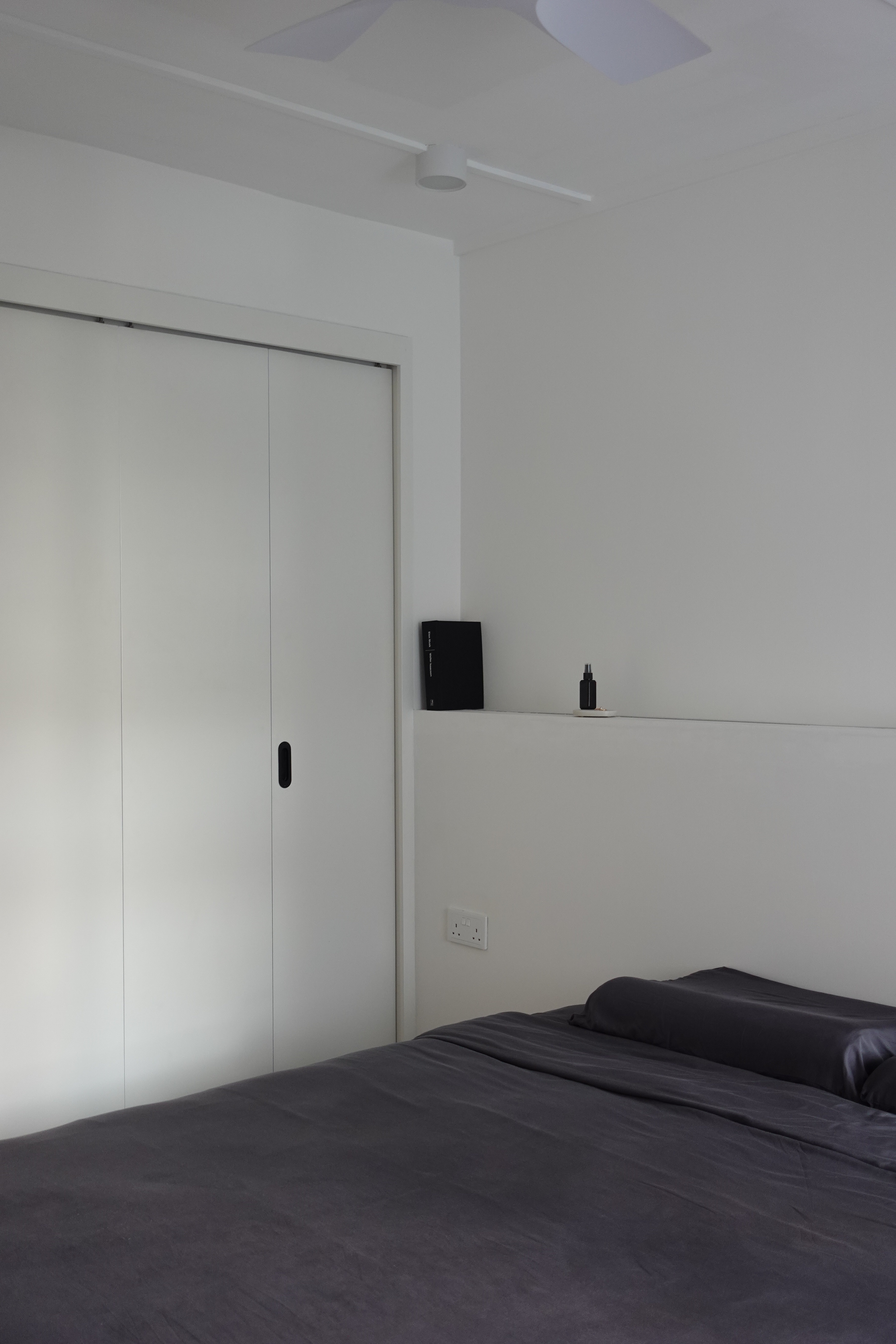 A minimal bedroom with a wardrobe that you’ve never seen before - White minimalist bedroom, modern design, sleek wardrobe