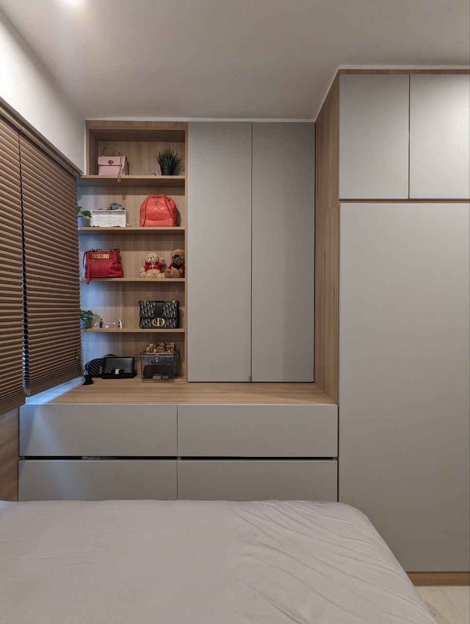 A Cosy Sanctuary: Rise and Shine! - Wooden shelves, minimalist design, organized storage, pastel pink bag, red quilted bag