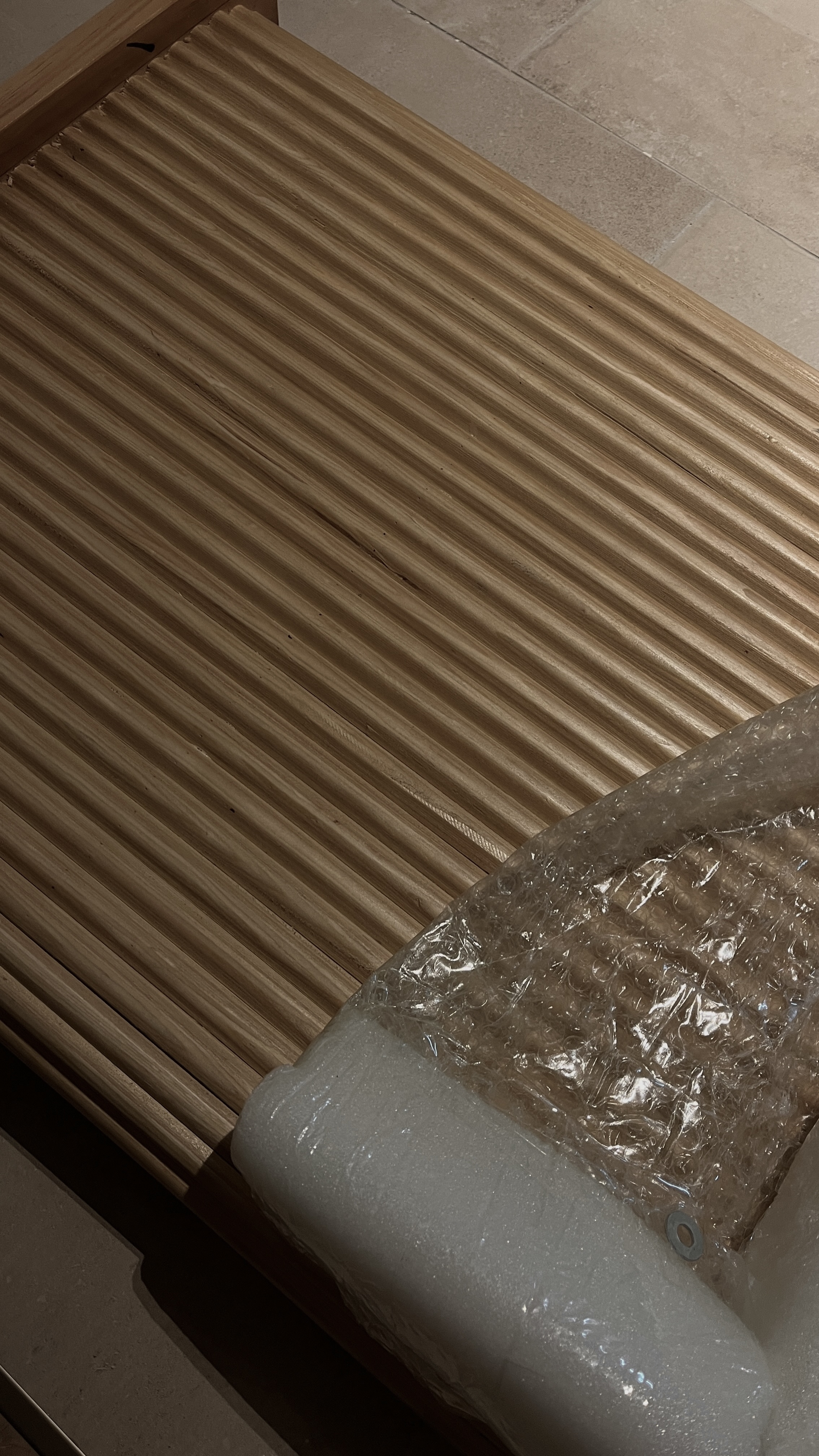 Dining Space: cafe vibes at home - Wooden slatted surface, bubble wrap, plastic wrap, cushioned seating, indoor setting