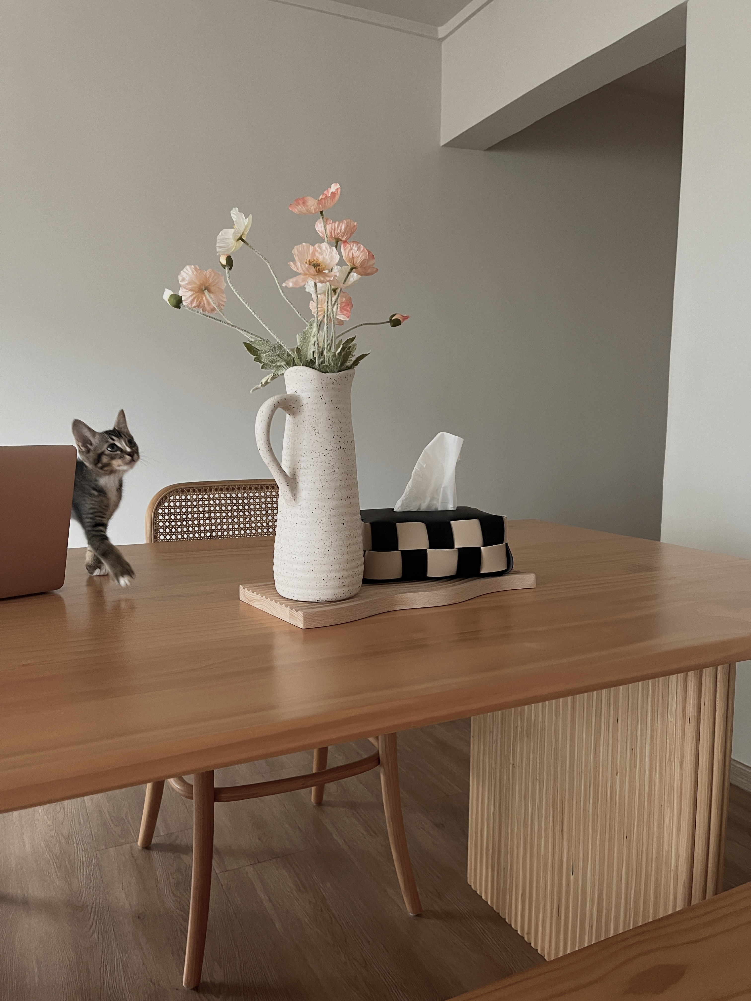 Dining Space: cafe vibes at home - vibrant floral arrangement, cozy indoor setting, modern furniture, wooden table, striped