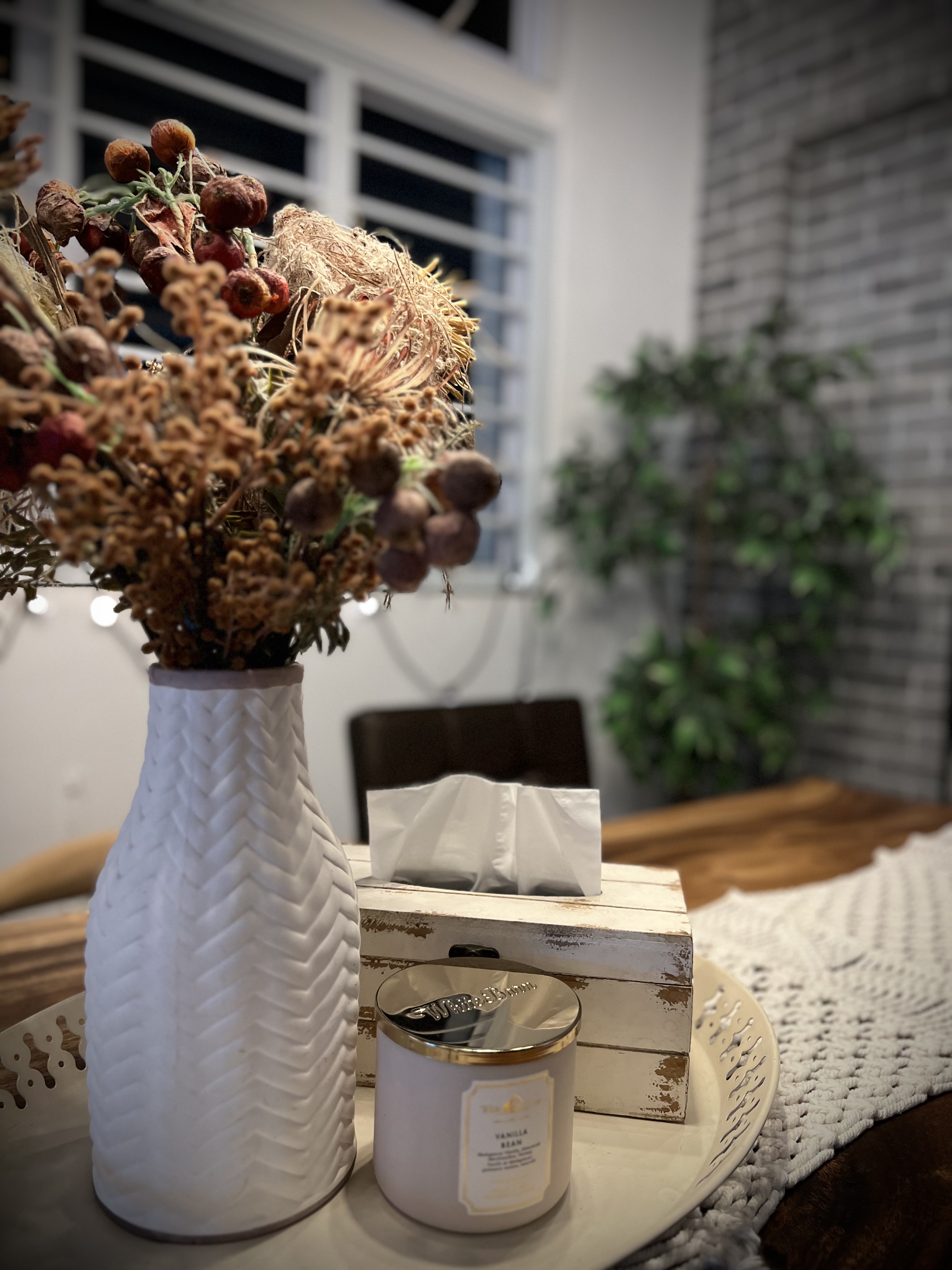 Dining Space: More than just meals - vase with dried flowers, rustic candle, white textured vase, autumnal decor, cozy room