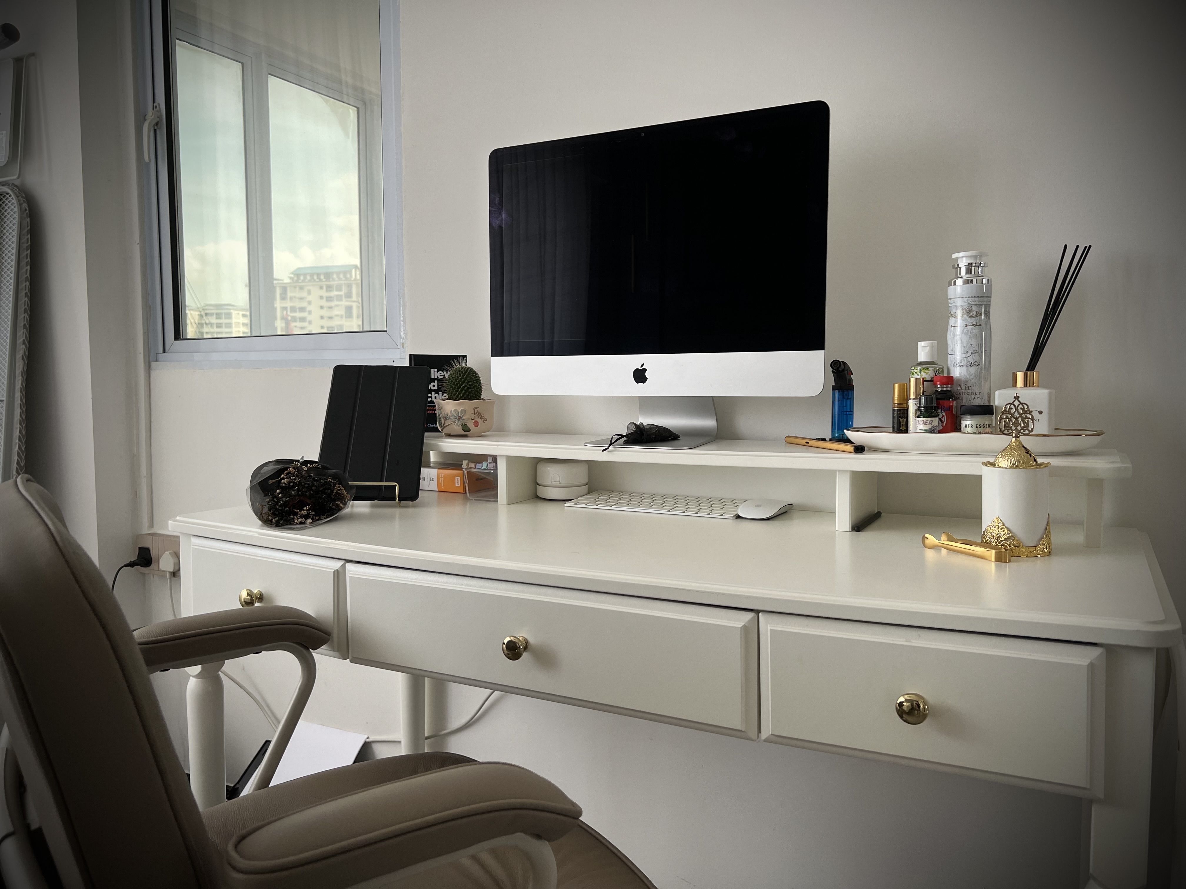 Bedroom: White, Gold and Grey Colour Scheme - Modern workspace, minimalist decor, sleek monitor, white desk, ergonomic chair