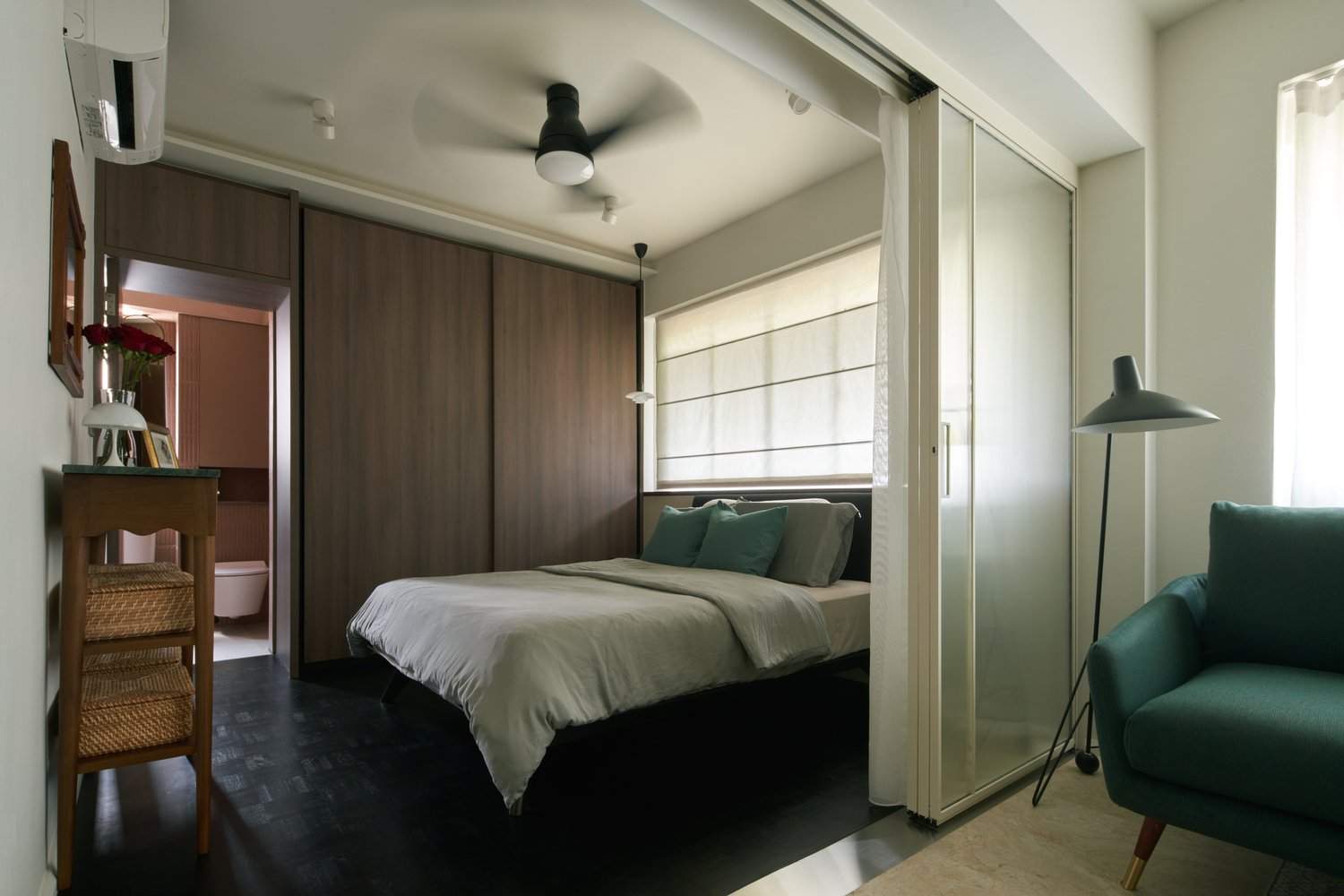 Master Bedroom @ Mmangofish - Modern bedroom with wooden paneling, minimalist design, large bed with teal pillows