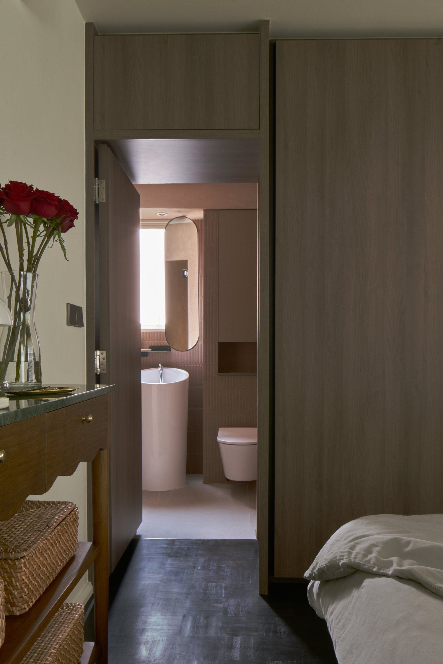 Master Bedroom @ Mmangofish - Modern bathroom interior, minimalist design, wooden cabinets, sleek vanity, white pedestal