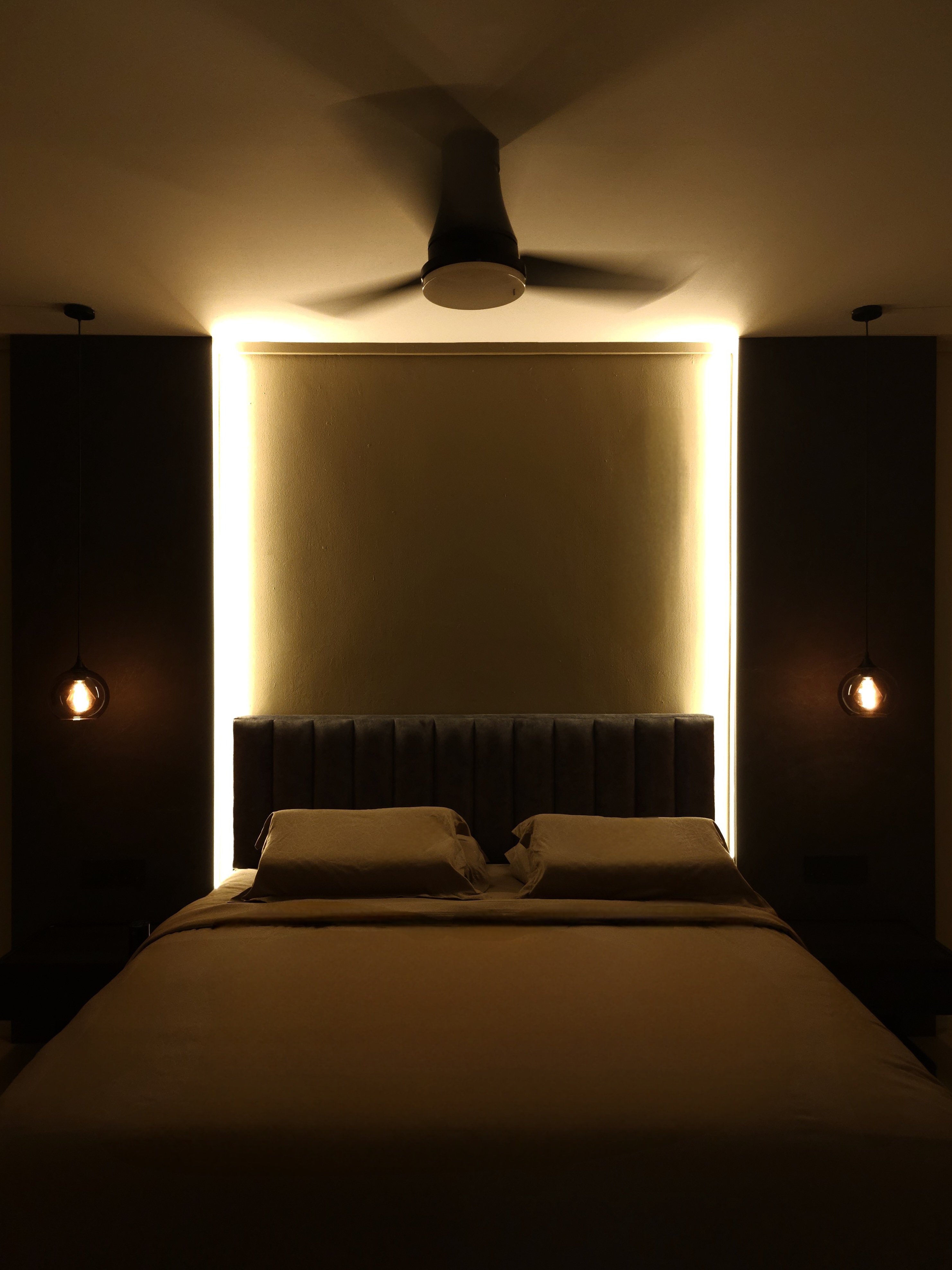 Bedroom: Our Sleep Haven - dimly lit bedroom, cozy ambiance, warm lighting, soft shadows, bedside lamps, modern decor, dark
