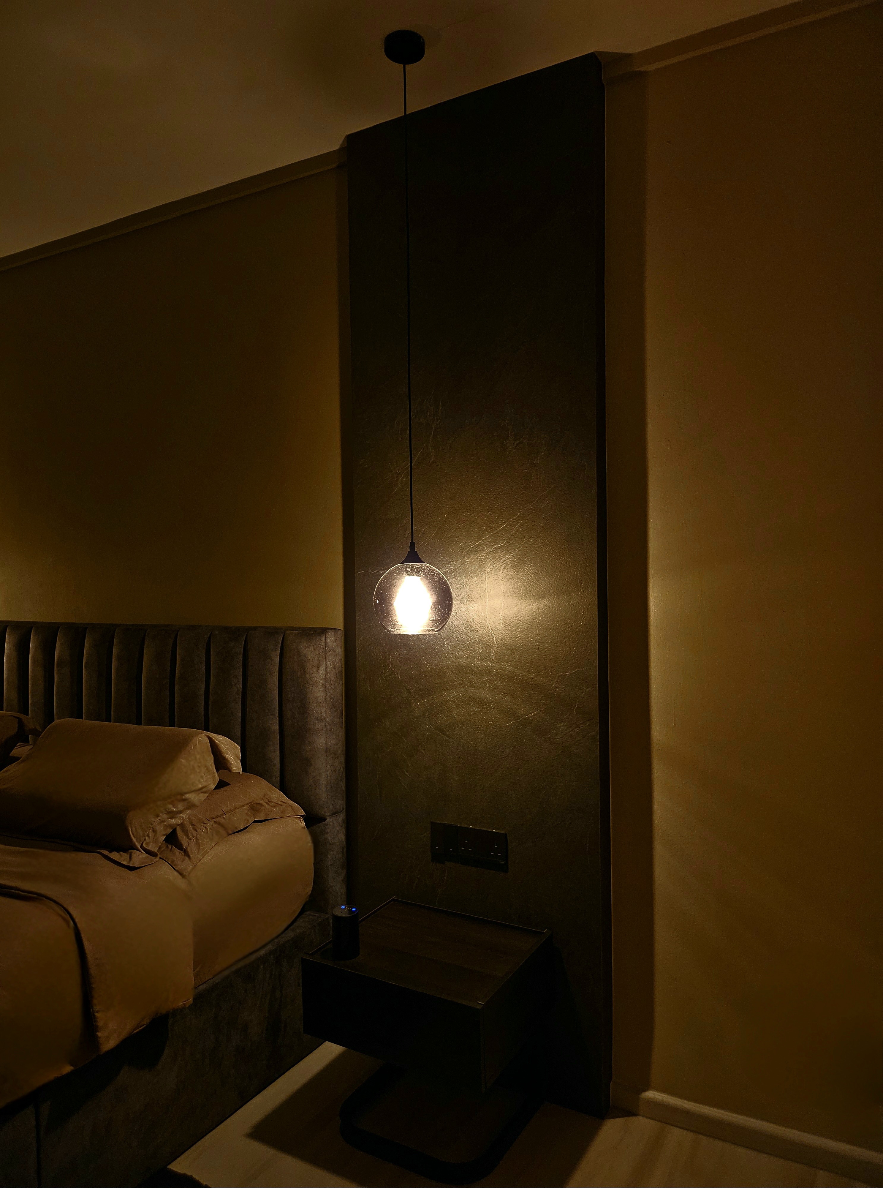 Bedroom: Our Sleep Haven - dimly lit bedroom, modern decor, cozy ambiance, soft lighting, warm tones, textured wall, plush