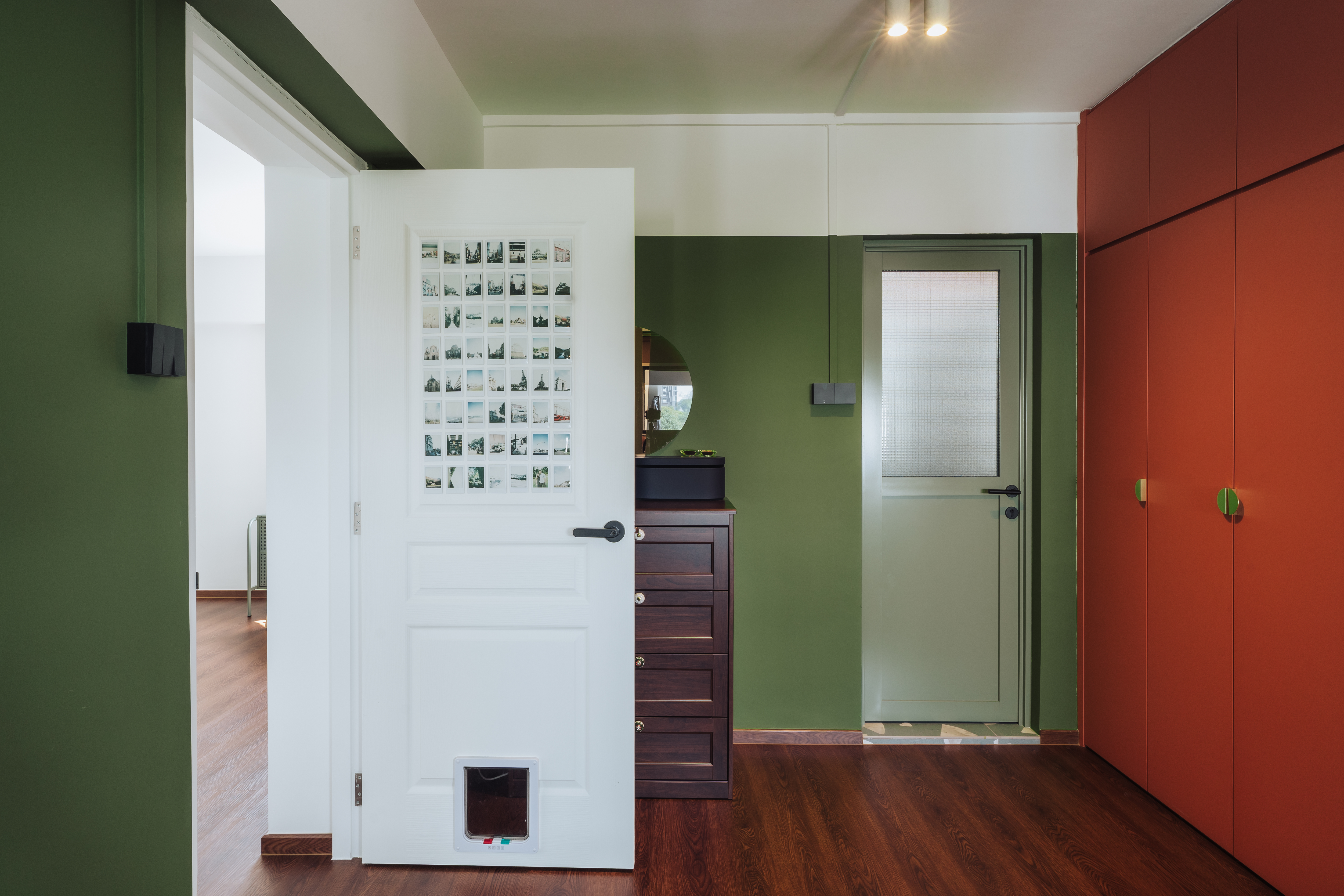 Cosy nights in The Garlic HQ bedroom! - Green walls, white door, wooden floor, dark wooden cabinet, small black speaker