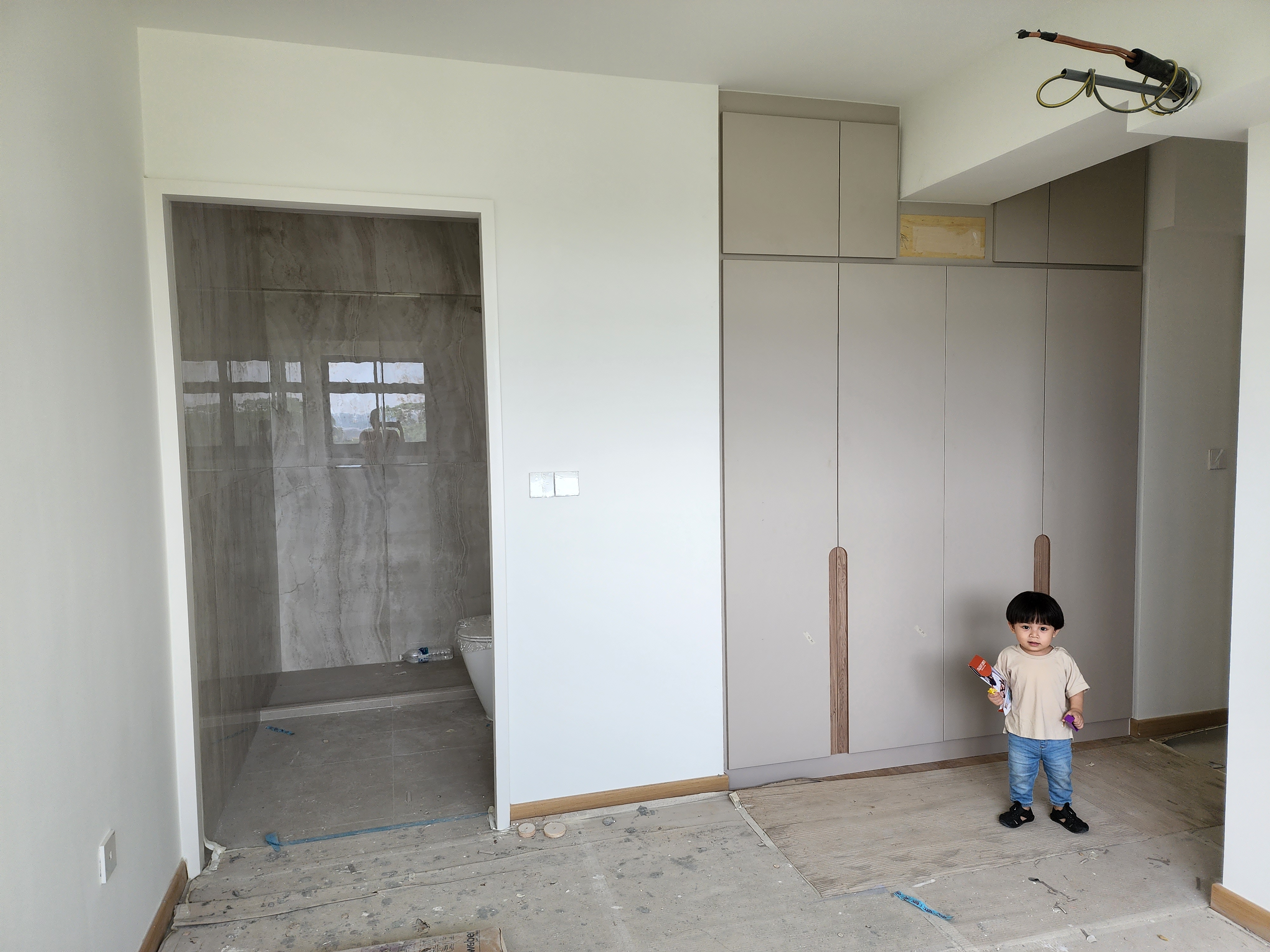 Master Bedroom - Simplicity in slumber - Modern bathroom renovation, unfinished cabinetry, child exploring, child's