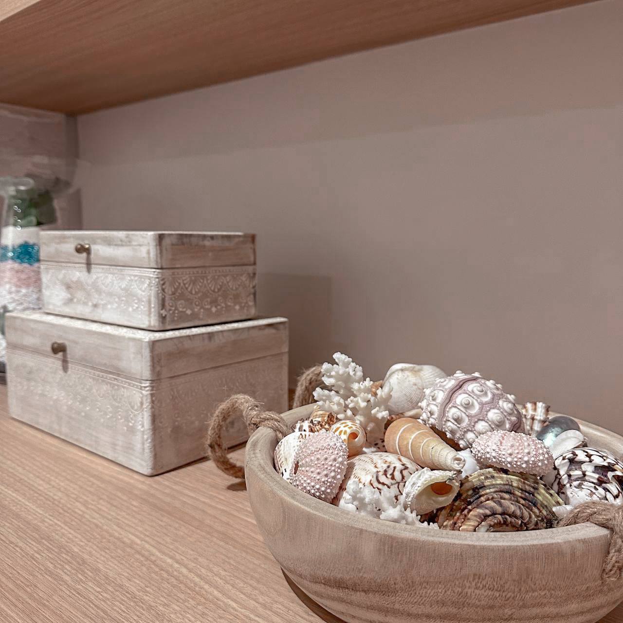 Farmhouse Living Room with Brick Walls! - vintage wooden boxes, stacked neatly, decorative boxes, rustic charm, textured