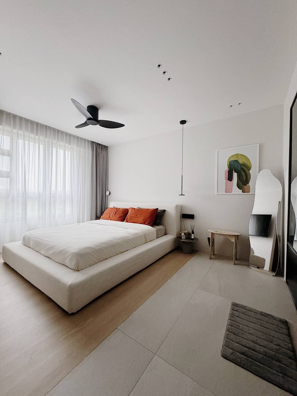 Our 'Hotel' inspired Bedroom like Everyday Retreat - Modern minimalist bedroom with large bed, beige upholstered bench, soft