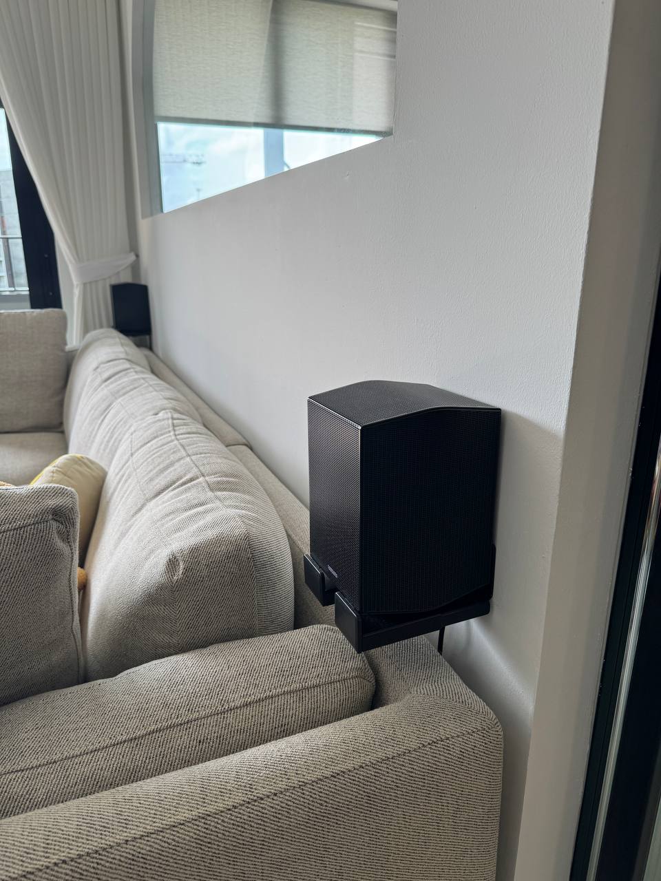 The Perfect Corner to be a Couch Potato - Modern living room, minimalist decor, beige sectional sofa, soft lighting, large