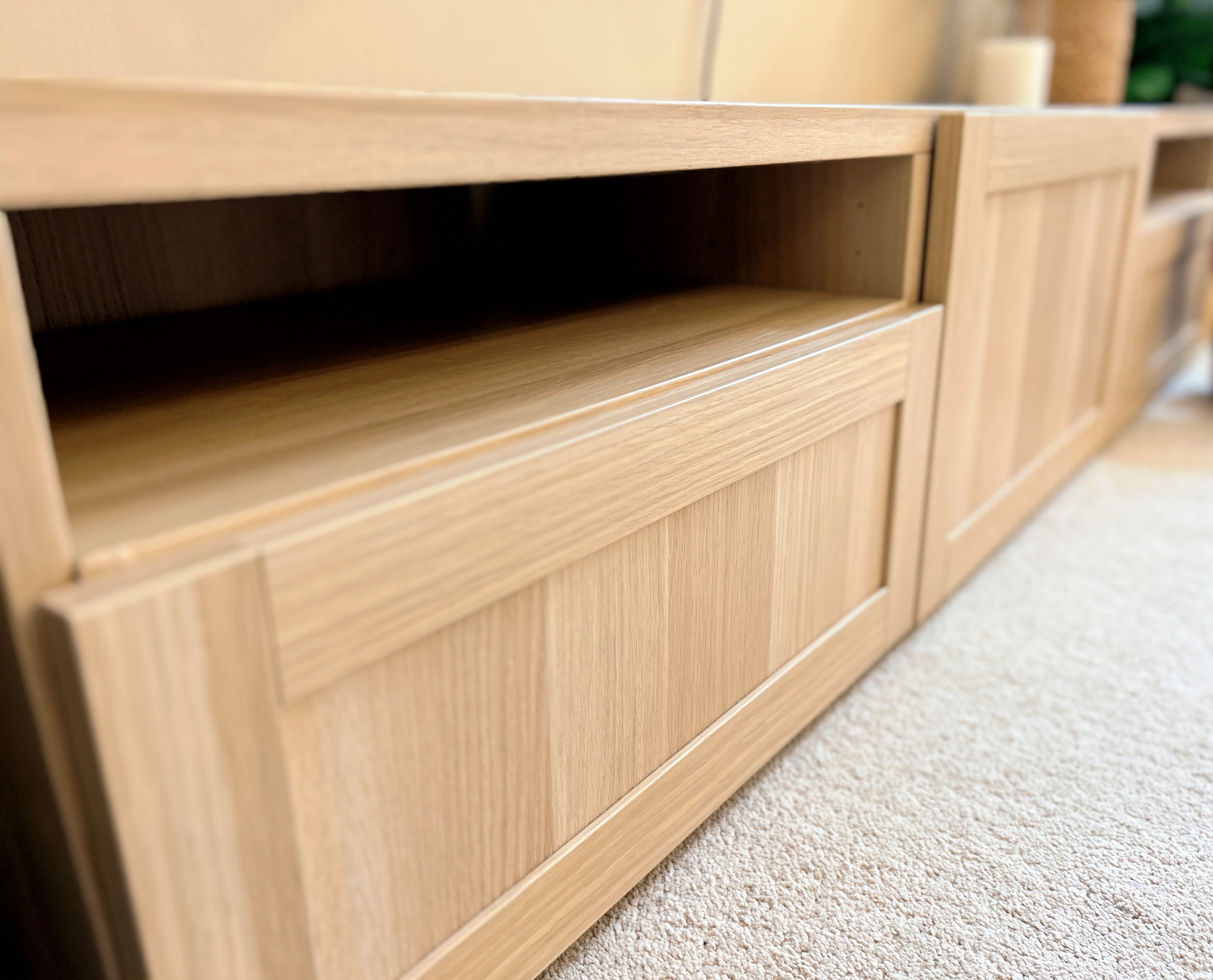 Welcome to our tranquil bedroom sanctuary, where relaxation awaits! - Light wooden furniture, minimalist design, light beige