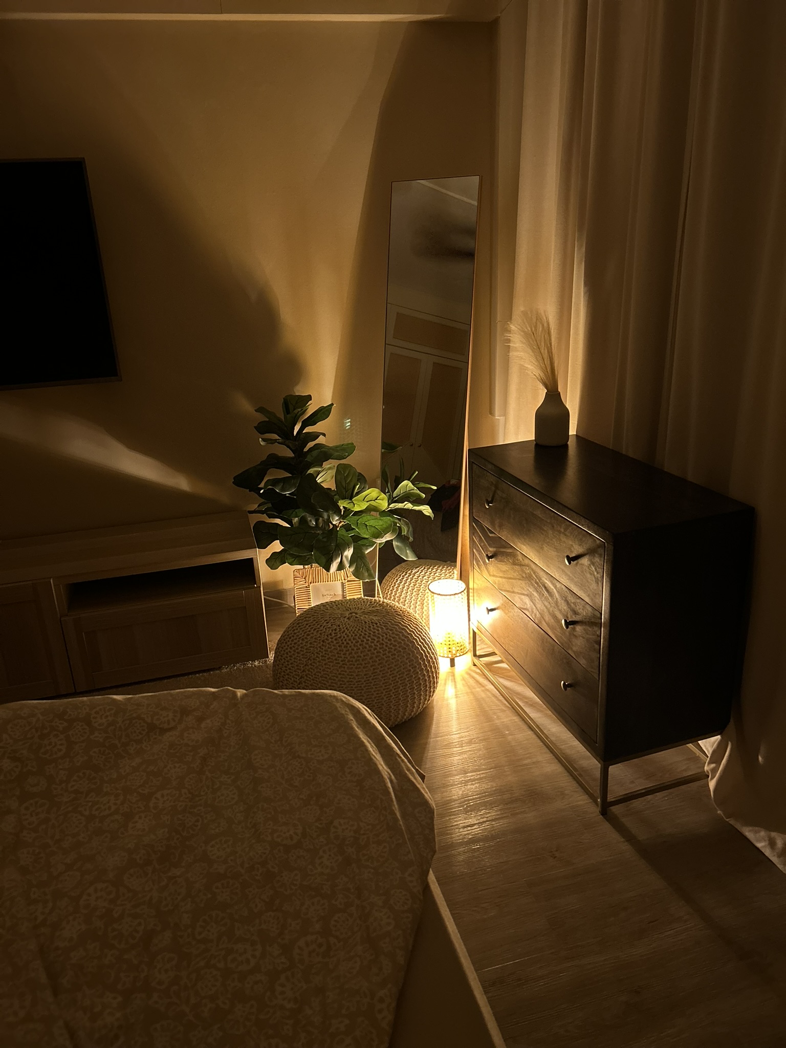 Welcome to our tranquil bedroom sanctuary, where relaxation awaits! - Warm, cozy, dimly lit, serene, tranquil, inviting