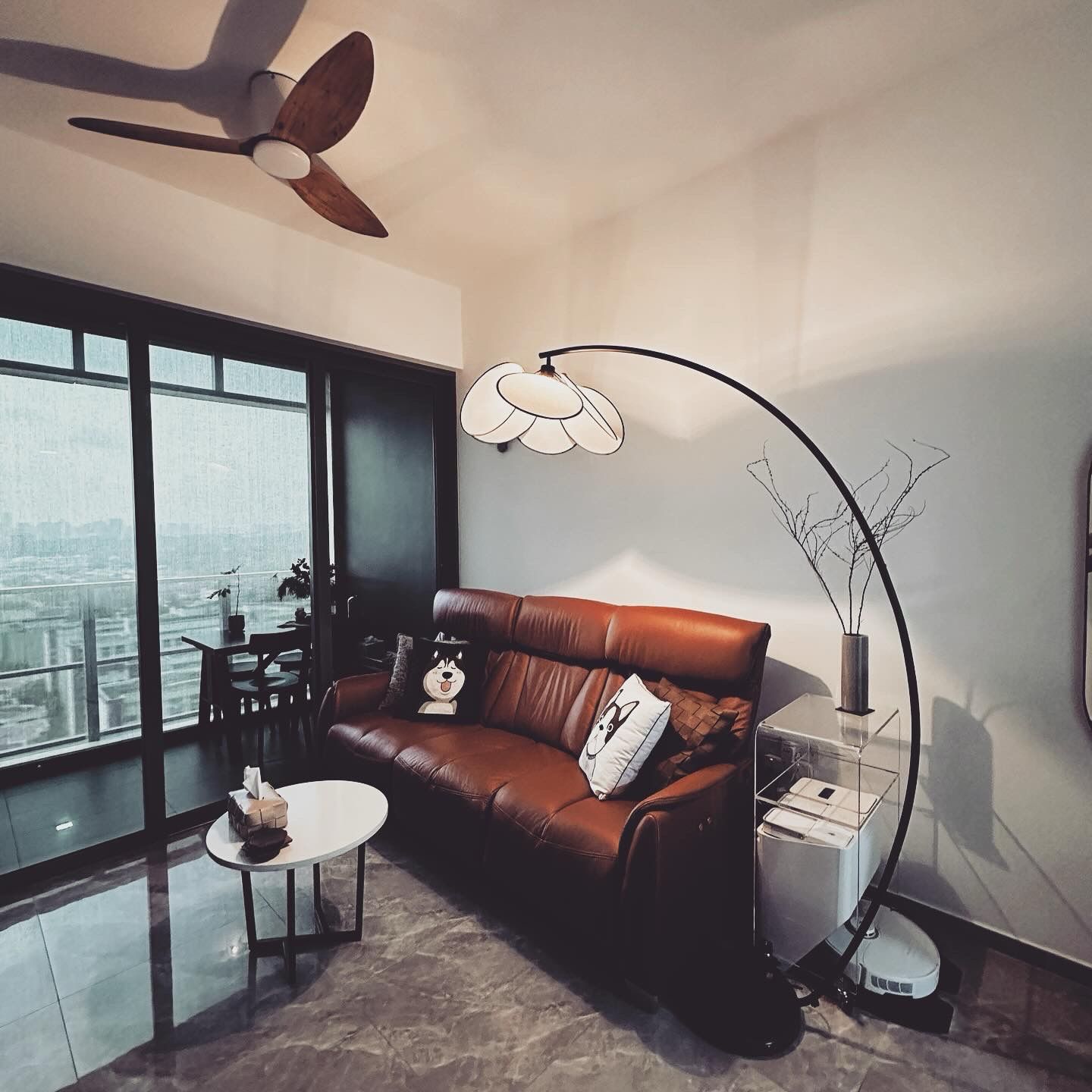 Cosy Living Room: Japandi & Leather Combination  - Modern living room with large windows, brown leather sofa, decorative