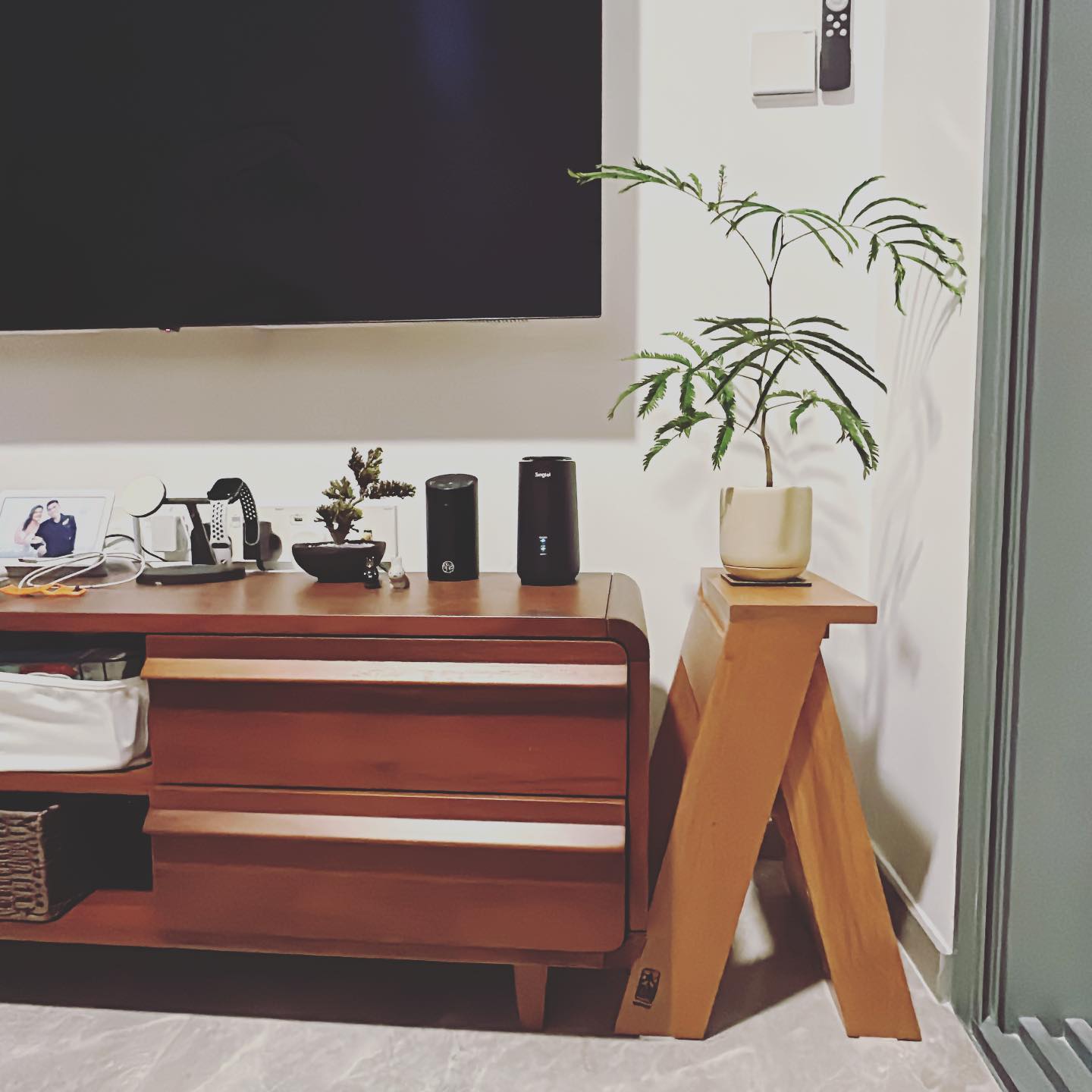 Cosy Living Room: Japandi & Leather Combination  - smart home device, modern living room, entertainment center, TV stand