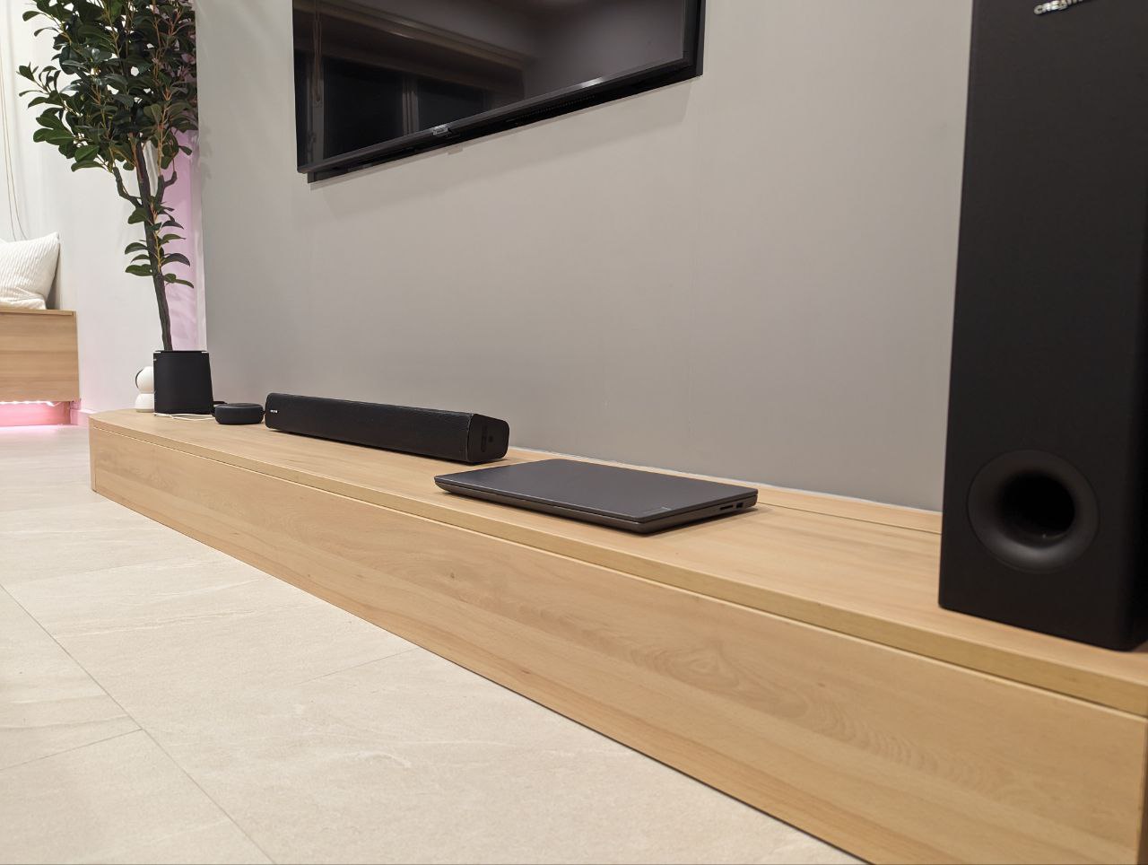 Step into our DIY living room  - Wooden entertainment center, modern living room, sleek design, minimalist decor