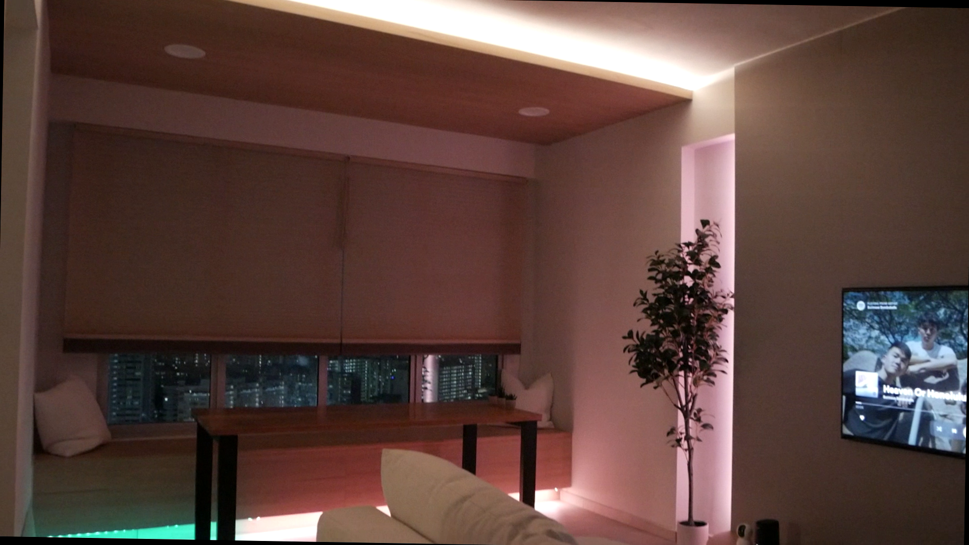 Step into our DIY living room  - Modern living room, cozy seating area, minimalist design, large windows, cityscape view